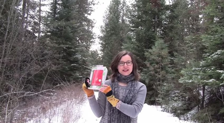 caption: Author Sharma Shields with her new novel, "The Sasquatch Hunter's Almanac."