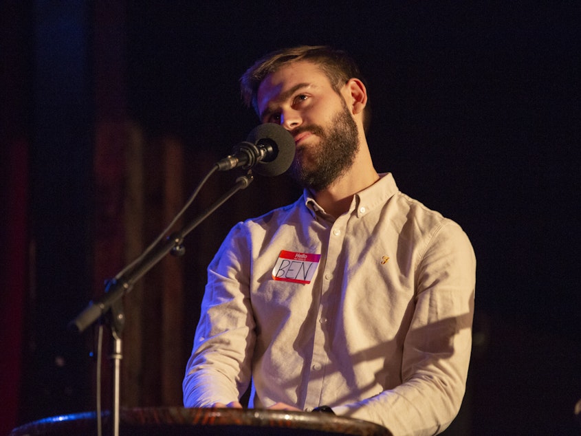 caption: Contestant Ben Kafoglis competes on <em>Ask Me Another</em> at the Bell House in Brooklyn, New York.