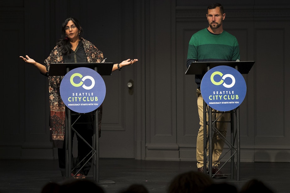 caption: Candidates for Seattle city council in district 3, Kshama Sawant, left, and Egan Orion, right, debate on Thursday, September 26, 2019, at Town Hall Seattle.