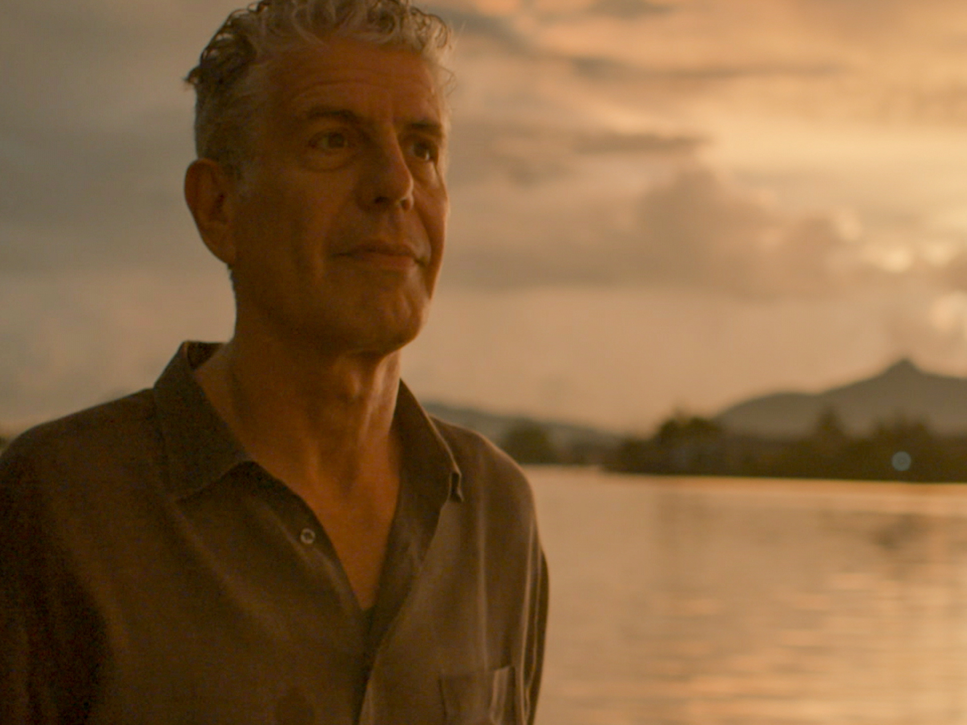 caption: The chef-turned-media personality died by suicide in 2018. His voice was recreated in the new documentary <em>Roadrunner</em> by AI technology.