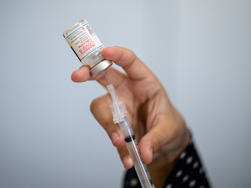 caption: To understand vaccine-induced immunity more fully, researchers are comparing antibody levels in people who received the Moderna vaccine but still got COVID-19 with levels in people who got the vaccine but didn't fall ill.