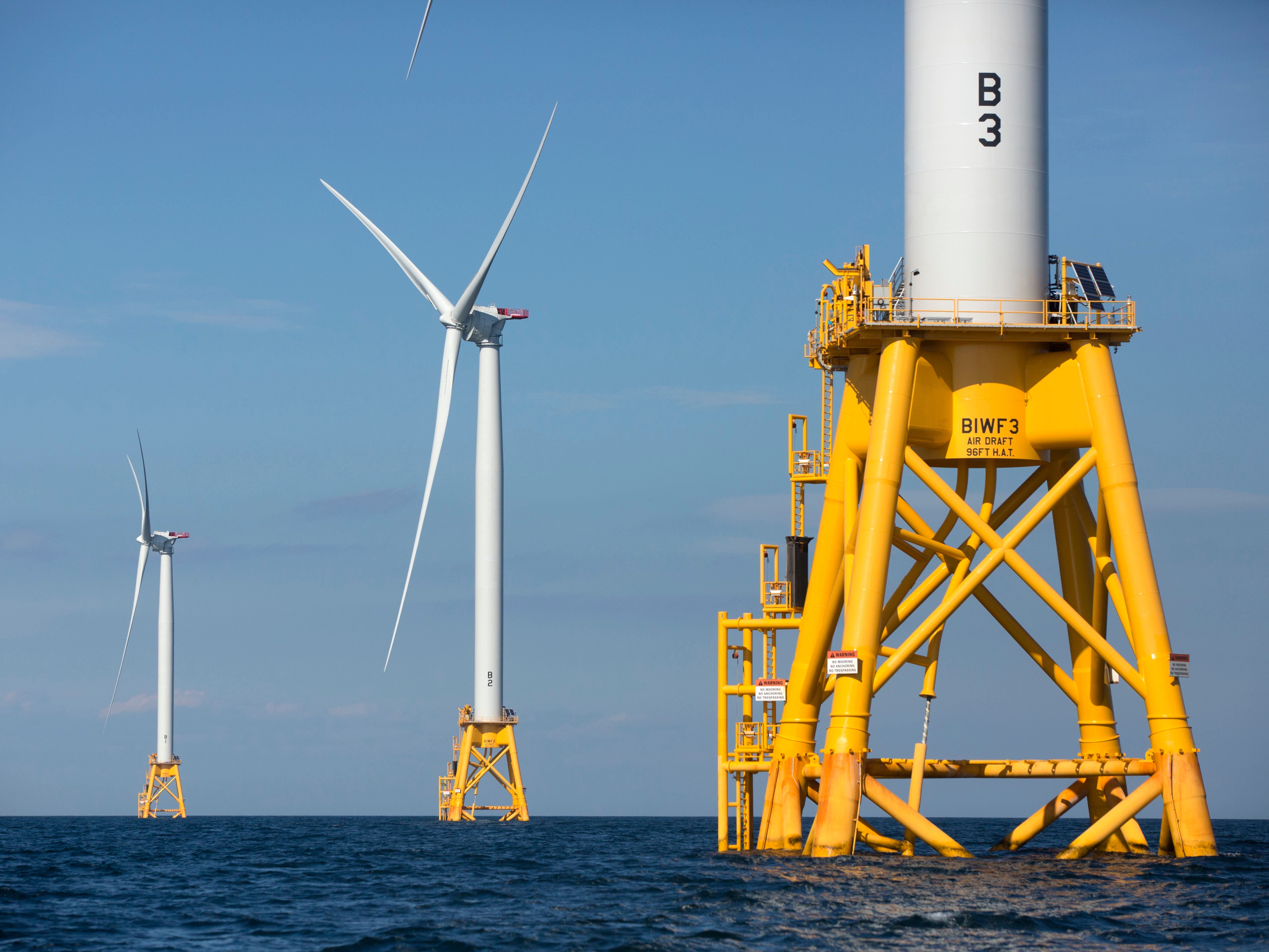 caption: Wind turbines are seen off the coast of Rhode Island. The Trump administration has tried to stop construction of five offshore wind projects that are being built along the East Coast.