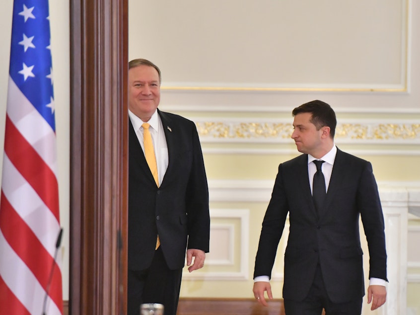 caption: Secretary of State Mike Pompeo (left) and Ukrainian President Volodymyr Zelenskiy arrive for a joint news conference in Kyiv, Ukraine, on Jan. 31.