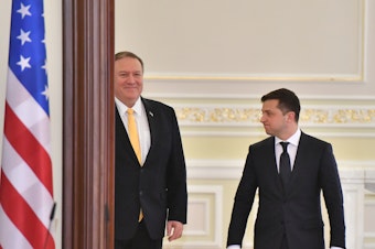 caption: Secretary of State Mike Pompeo (left) and Ukrainian President Volodymyr Zelenskiy arrive for a joint news conference in Kyiv, Ukraine, on Jan. 31.
