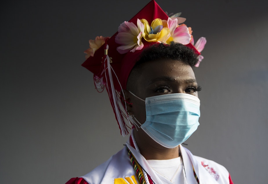 caption: Cleveland Stem High School senior Amanjey Kidane stands for a portrait ahead of the in-person commencement ceremony on Tuesday, June 15, 2021, at Memorial Stadium in Seattle. "We're growing up into adulthood and it's going to be overwhelming, but this is kind of like a new chapter," said Kidane. "I'm very excited but at the same time kind of anxious."