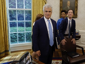 caption: President Biden's chief of staff Jeff Zients, seen here in the Oval Office on May 16, 2023, is working with federal agencies to brace for a government shutdown this weekend.