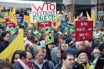 caption: WTO protesters on 7th Avenue, 1999