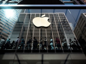 caption: Earlier this month, Apple became the first private-sector company to be worth $1 trillion.
