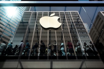 caption: Earlier this month, Apple became the first private-sector company to be worth $1 trillion.