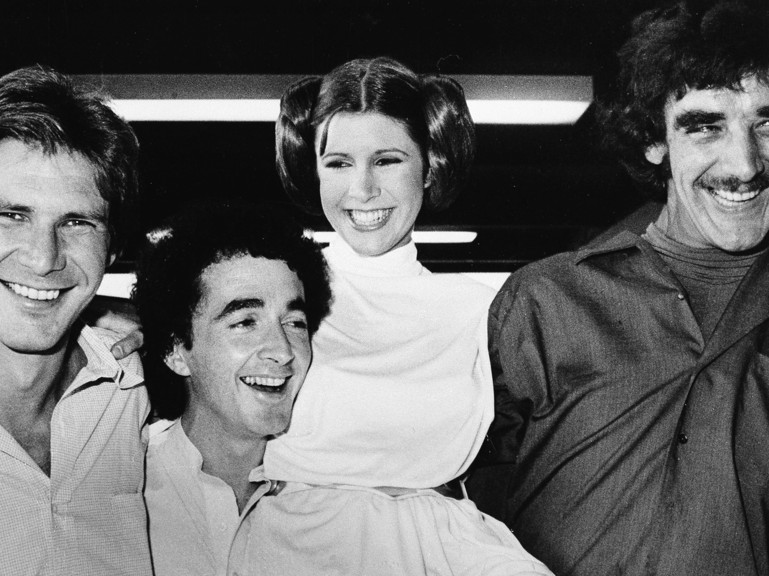 caption: In 1978, <em>Star Wars</em> actors (from left) Harrison Ford, Anthony Daniels, Carrie Fisher and Peter Mayhew.