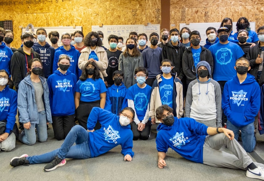caption: The 2021-2022 season of the Interlake High School Saints Robotics team. Aparna is in the back row, farthest to the right. 