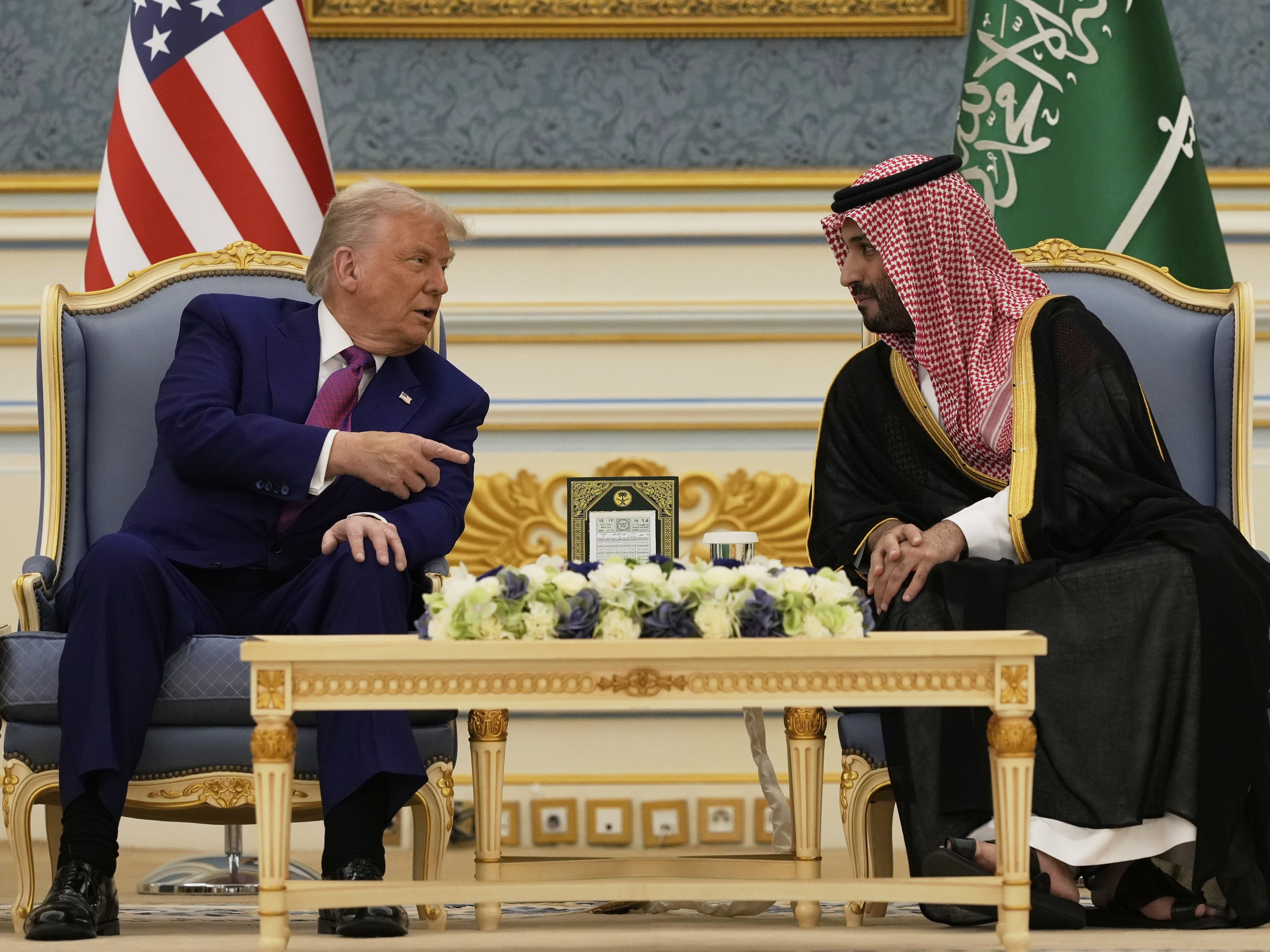 caption: President Donald Trump and Saudi Crown Prince Mohammed bin Salman speak during a meeting at the Royal Palace in Riyadh, Saudi Arabia on May 13, 2025.