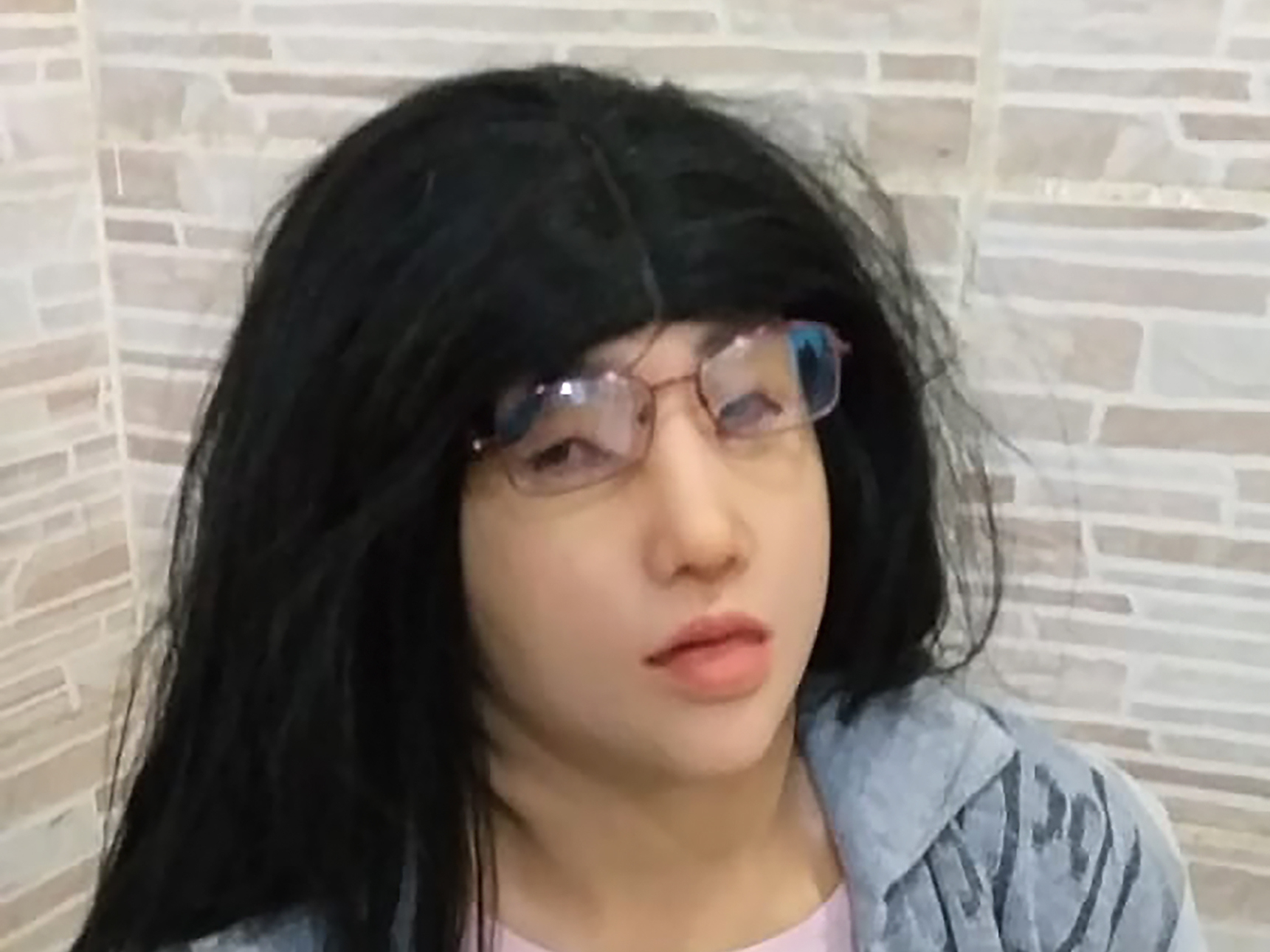 caption: Authorities say jailed Brazilian drug trafficker Clauvino da Silva tried but failed to escape from a prison in Rio de Janeiro wearing this disguise.