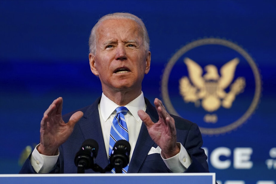 caption: President-elect Joe Biden speaks during an event at The Queen theater, Thursday, Jan. 14, 2021, in Wilmington.