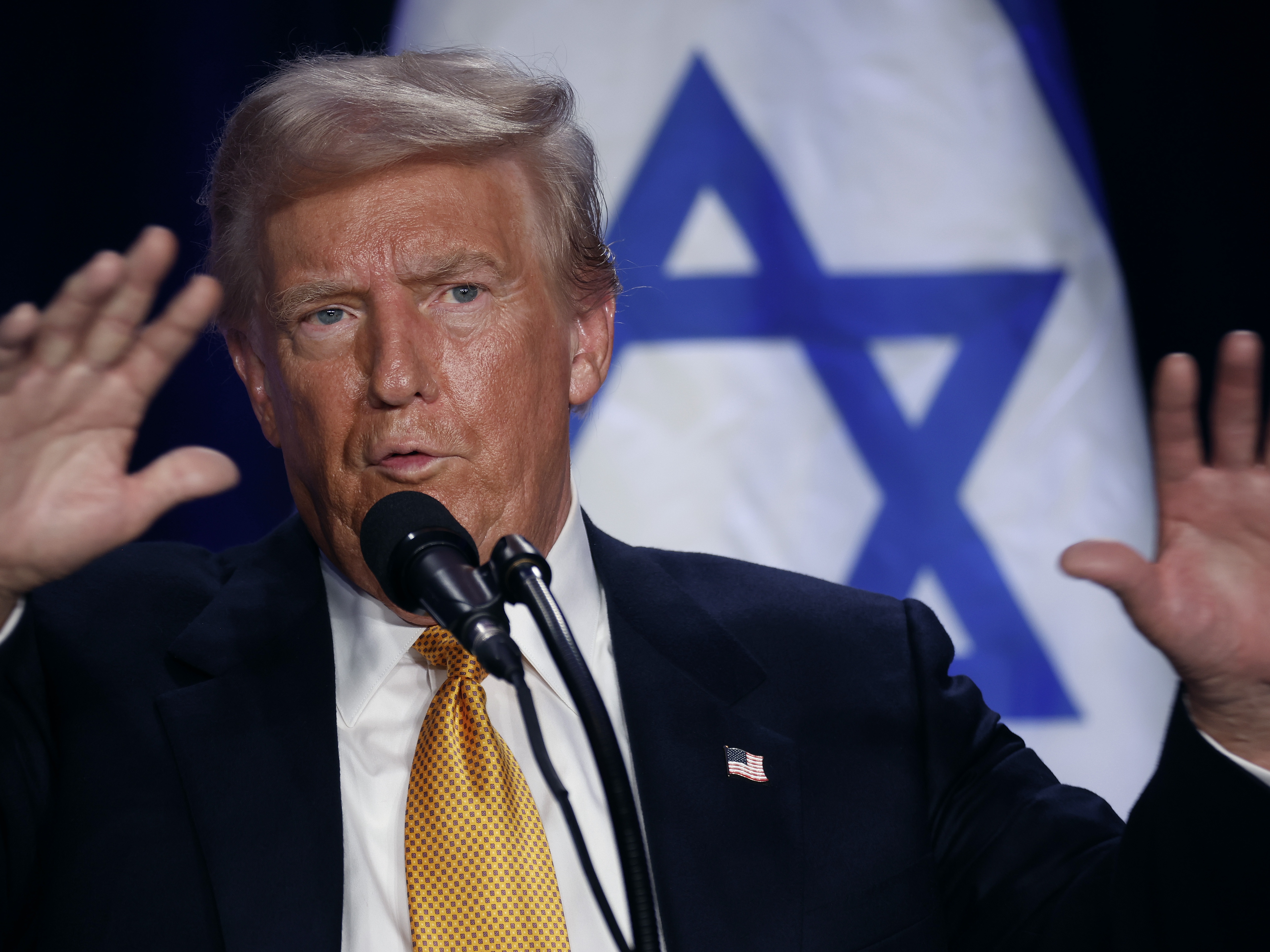 caption: Former President Donald Trump speaks before prominent Jewish donors at an event titled "Fighting Anti-Semitism in America" in Washington, D.C., on Sept. 19.