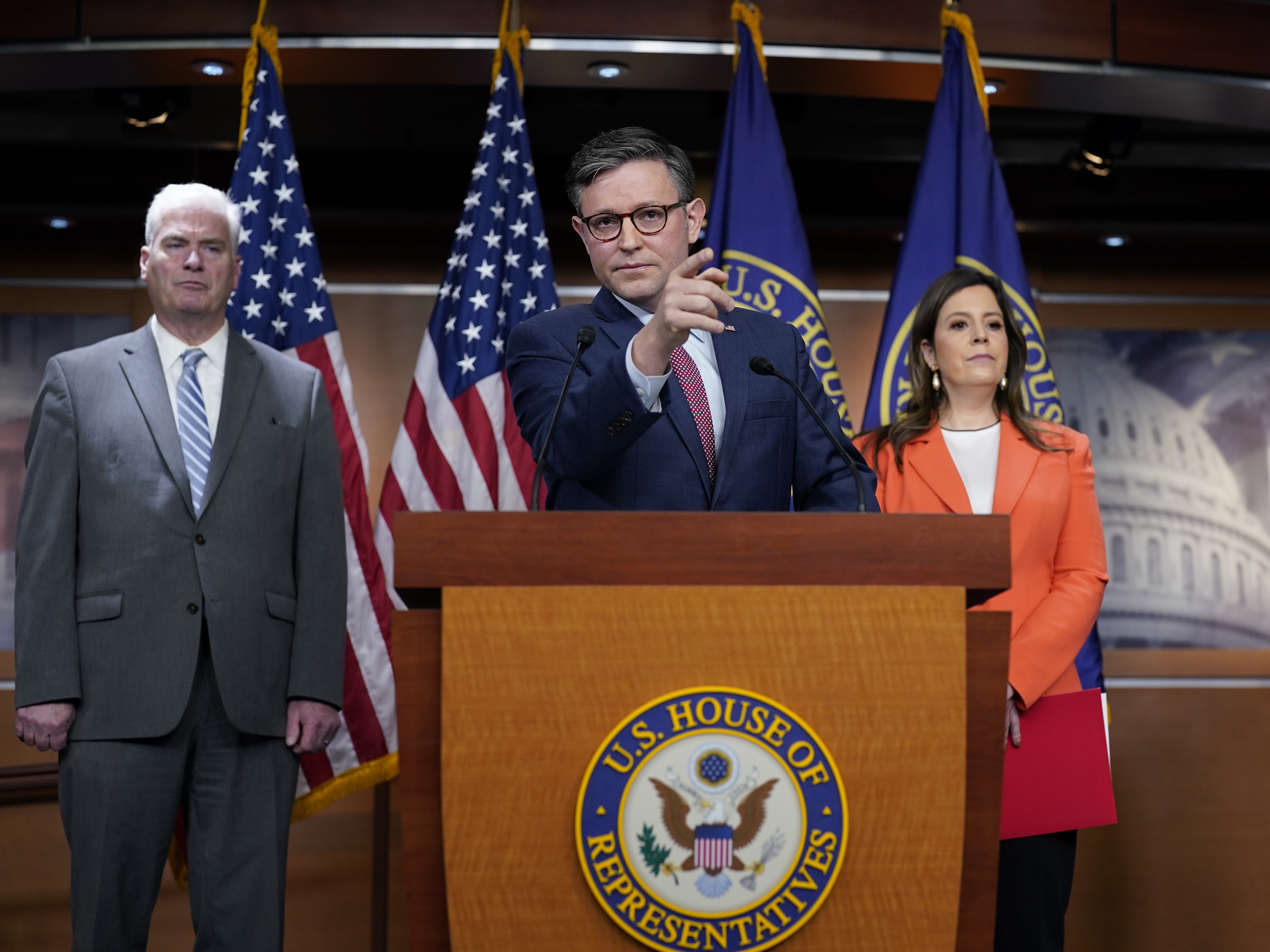 caption: Speaker of the House Mike Johnson, R-La., center, joined by, from left, Majority Whip Tom Emmer, R-Minn., and Republican Conference Chairperson Elise Stefanik, R-N.Y., talks with reporters ahead of the debate and vote on supplemental aid to Israel, at the Capitol in Washington, Thursday, Nov. 2, 2023.