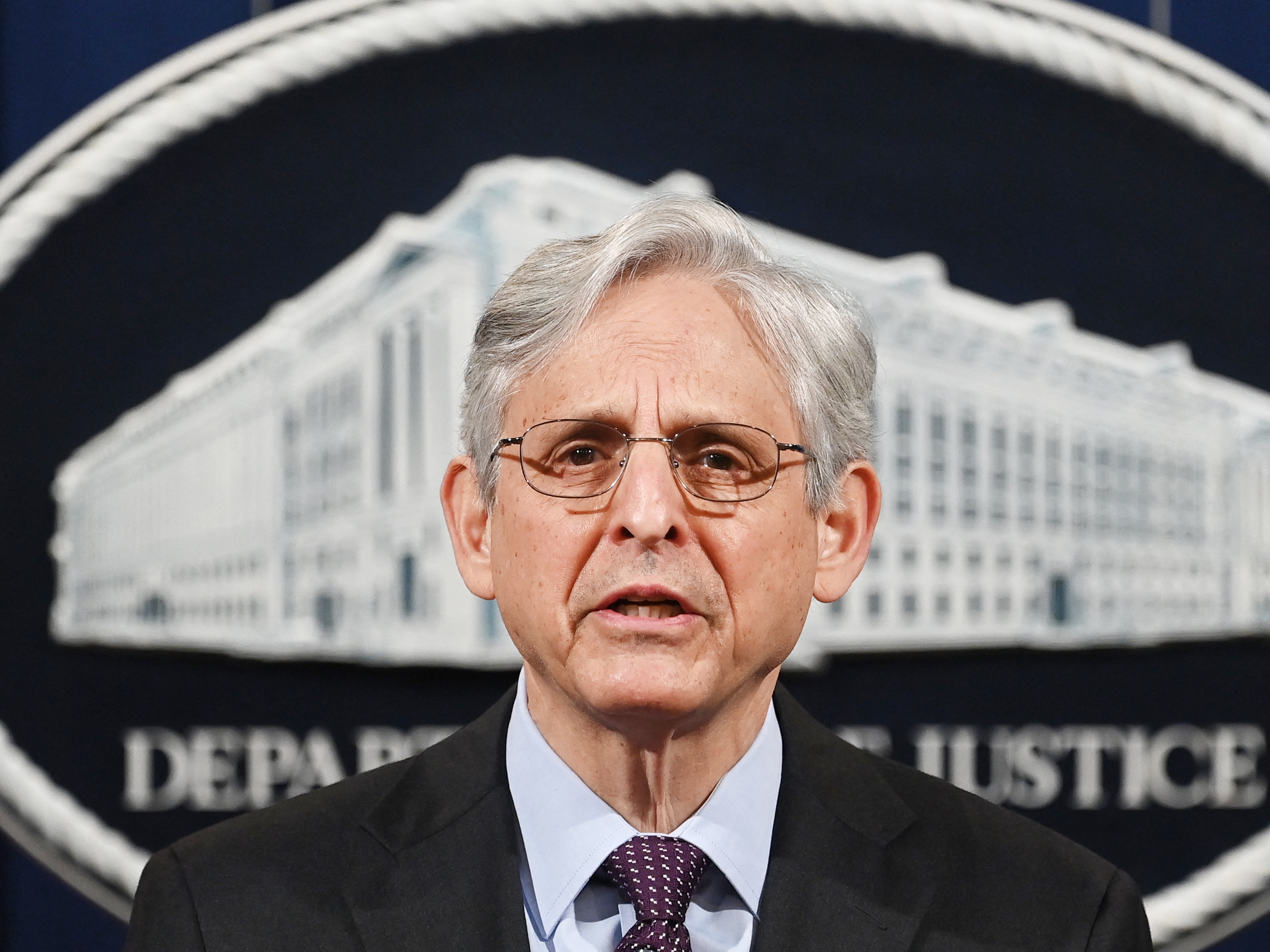 caption: Attorney General Merrick Garland speaks Monday at the Department of Justice in Washington. Garland announced the department will open an investigation into the Louisville Metro Police Department.