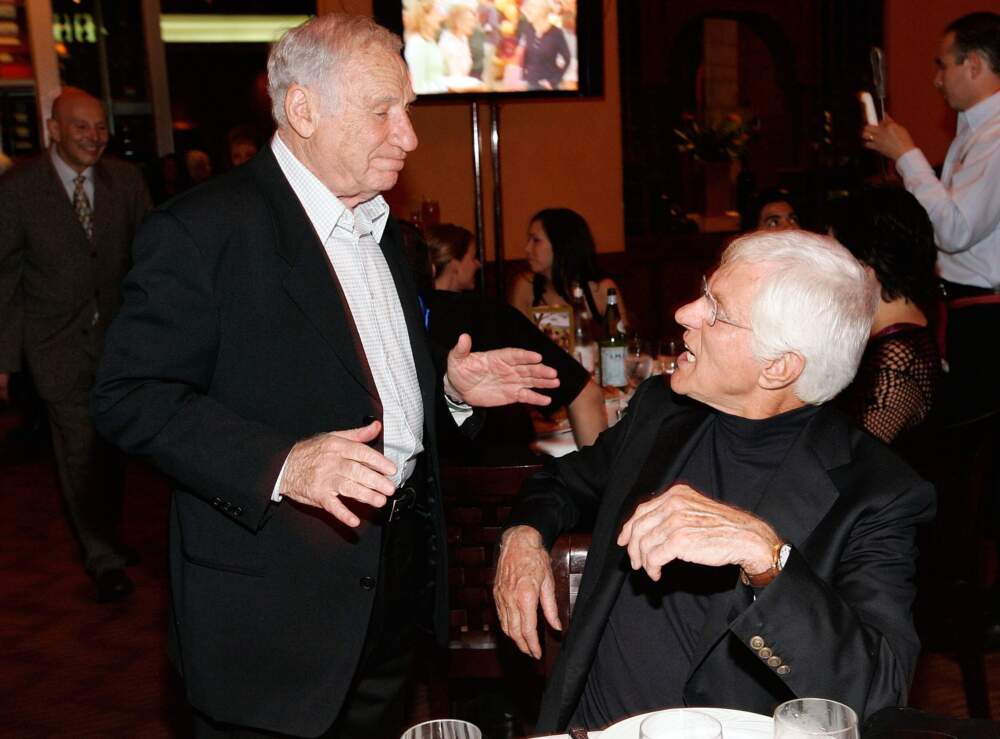 caption: Actor/Director/Producer Mel Brooks (L) and Actor Dick Van Dyke talk at the celebration for Cloris Leachman's 60 years in show business at Fogo De Chao restaurant on Oct. 5, 2006 in Beverly Hills, California.  (Vince Bucci/Getty Images)