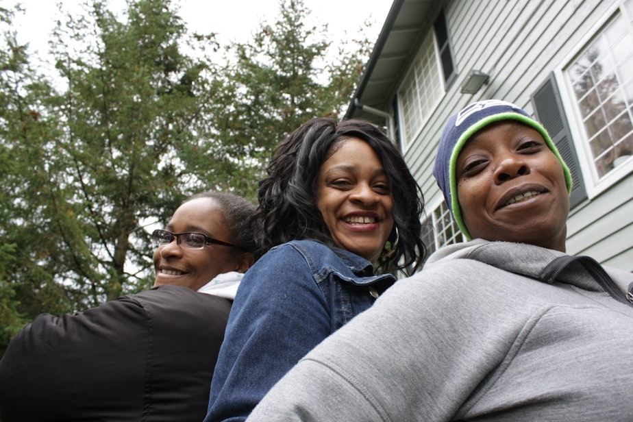 caption: Michelle Dozier, Toya Thomas and Elimika James faced eviction from the Renton Woods apartments, so they fought to bring renters' rights to Renton.