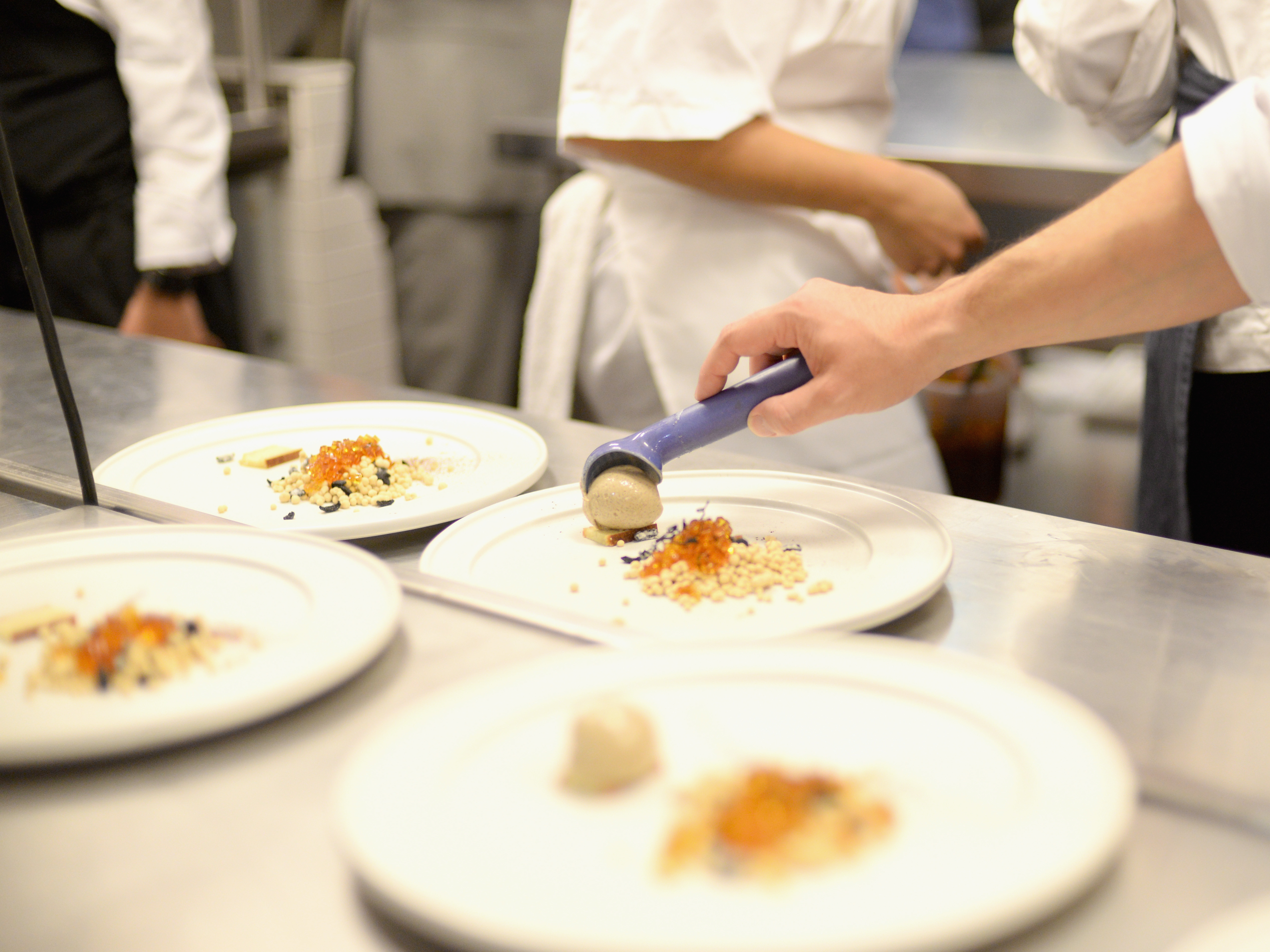 caption: Chefs prepare food at Mexico's Dinner With Enrique Olvera And Jordi Roca during Food Network & Cooking Channel New York City Wine & Food Festival presented By FOOD & WINE at Cosme NYC on October 15, 2015 in New York City. Cosme is one of six U.S. honorees on the 2021 list of the world's 50 best restaurants.