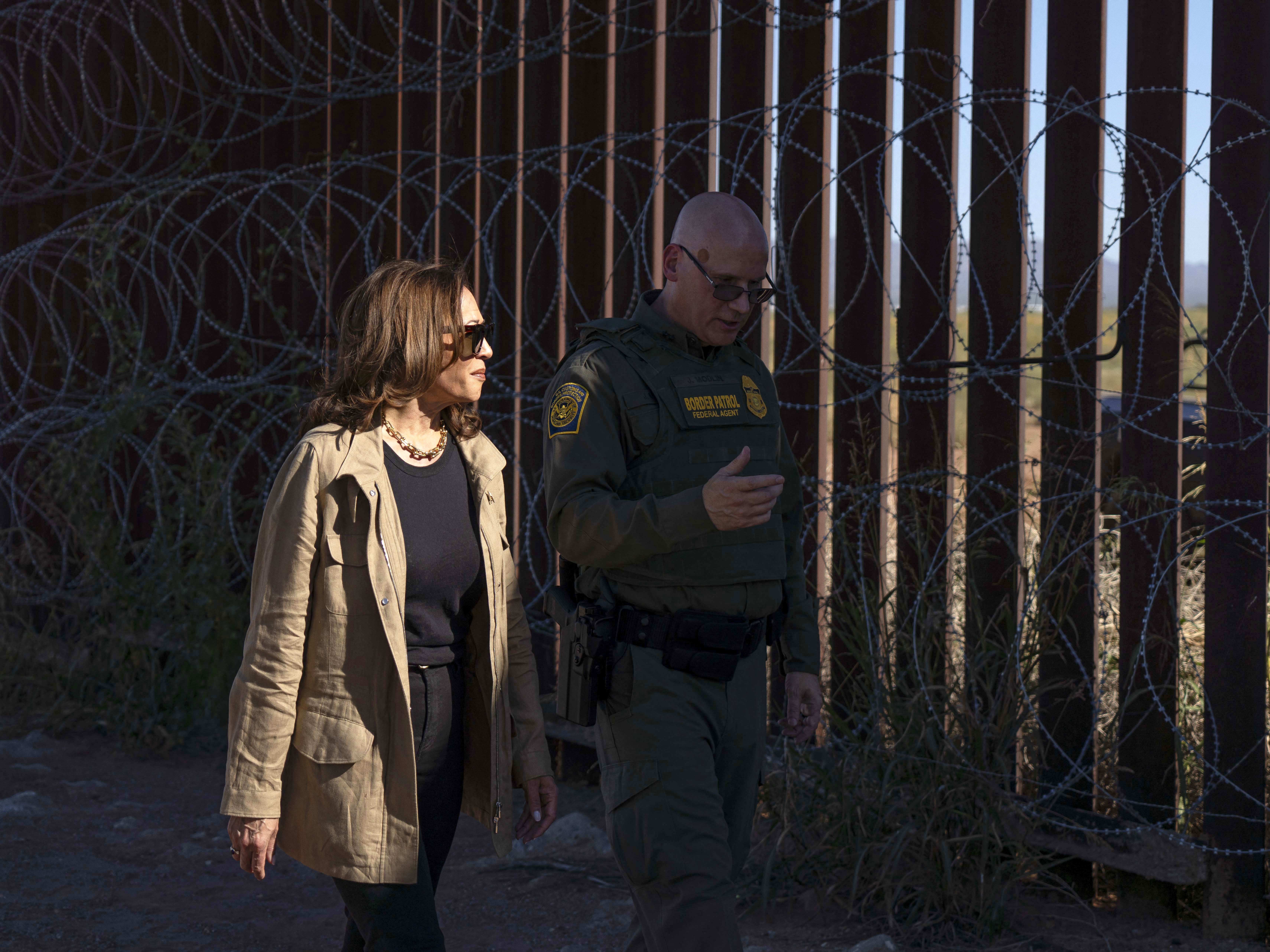 caption: Vice President Harris visits the U.S.-Mexico border with Border Patrol Tucson Sector chief John Modlin in Douglas, Ariz., on Sept. 27, 2024.