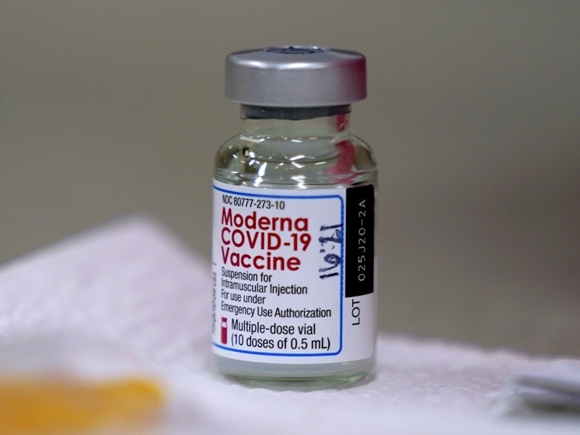 caption: Moderna's COVID-19 vaccine must be kept between 36 and  46 degrees Fahrenheit. The vials can remain at room temperature for up to 12 hours.