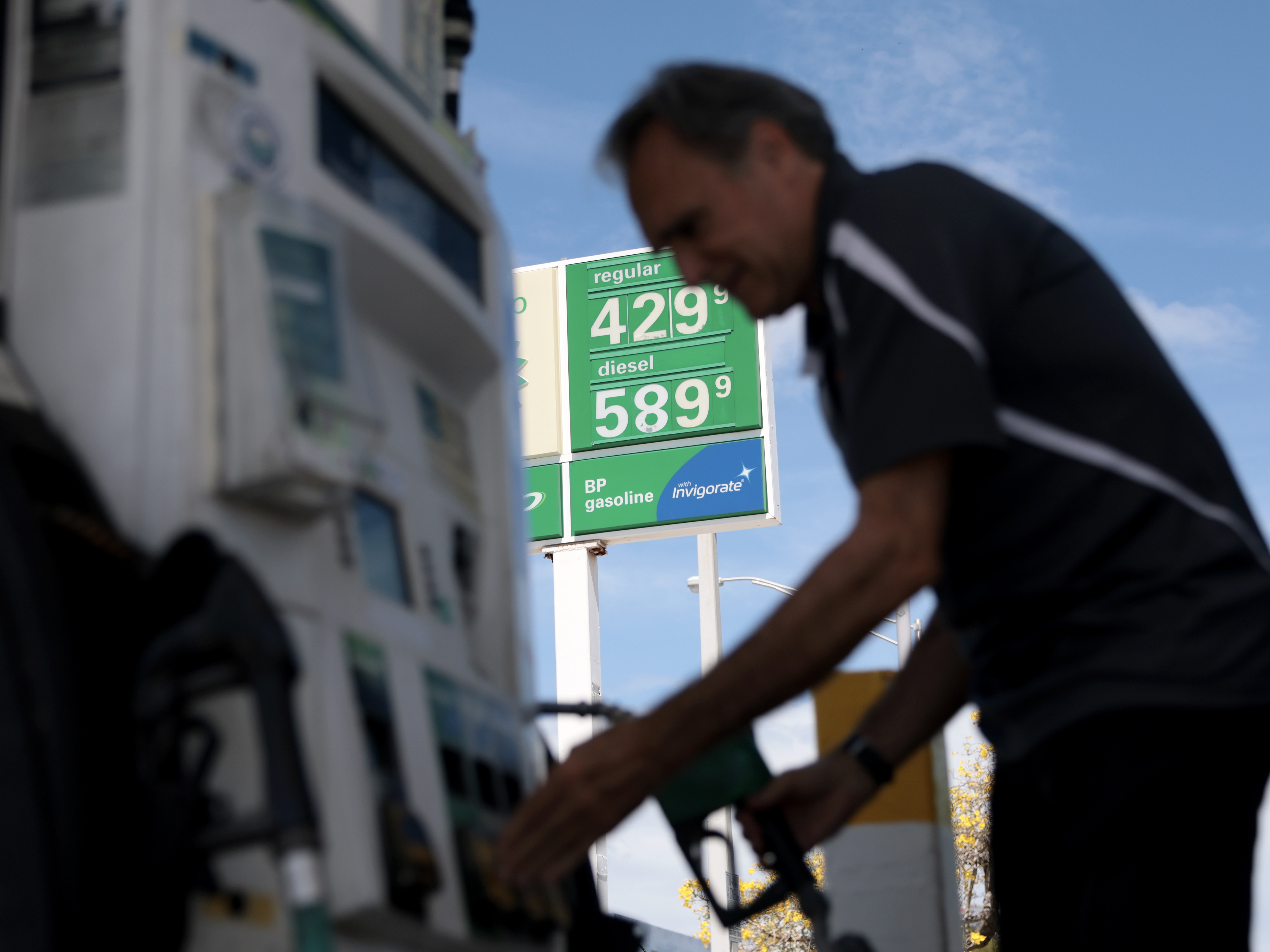 caption: Carlos Ferre puts fuel in his vehicle at a gas station on April 06, 2026 in Miami, Florida. Florida gas prices have risen to over $4 per gallon in early April 2026 as the war in Iran has  affected global oil supplies, leading to higher crude oil costs.