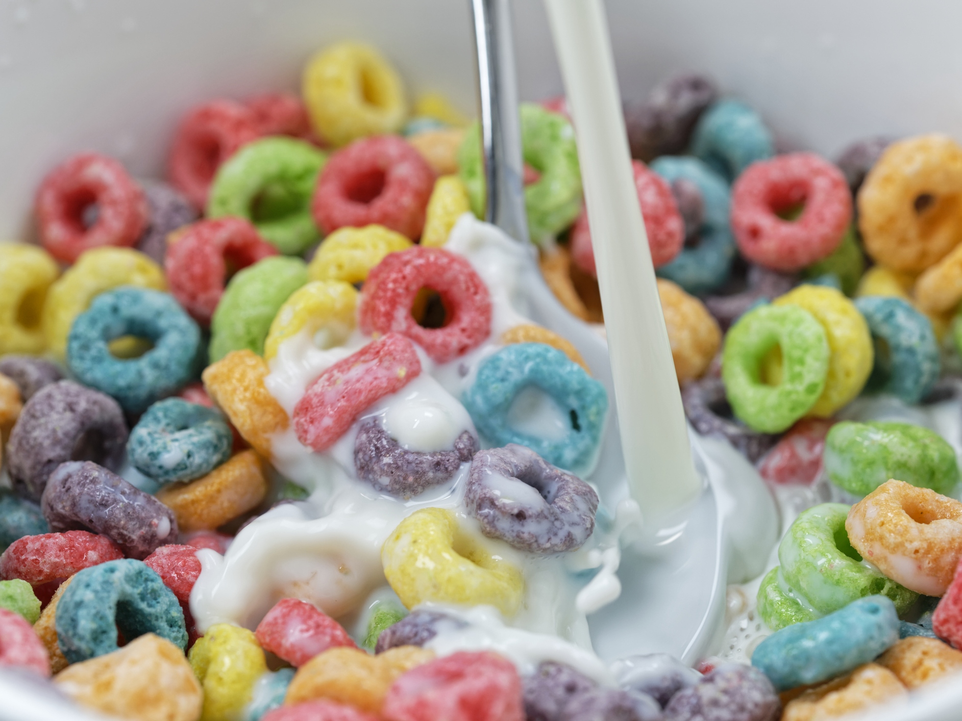 caption: A new study in the <em>American Journal of Preventive Medicine</em> found that just nine children's cereal brands advertised directly to kids dominated purchases by families with kids: Cocoa Puffs, Frosted Flakes, Froot Loops, Honey Nut Cheerios, Lucky Charms, Pebbles, Reese's Puffs, Toast Crunch and Trix.