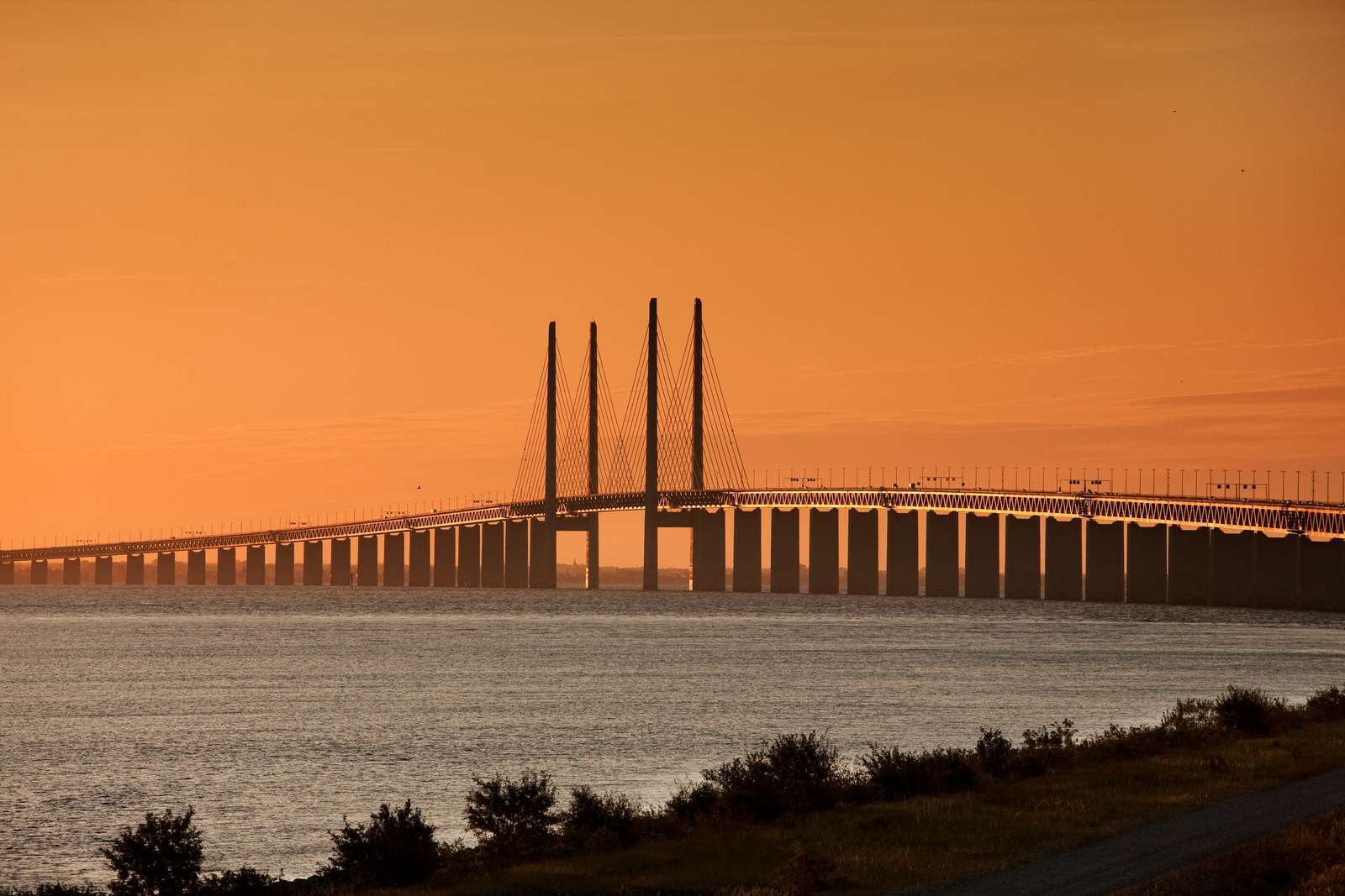 caption: The Oresund Bridge links Copenhagen, Denmark, and Malmo, Sweden.