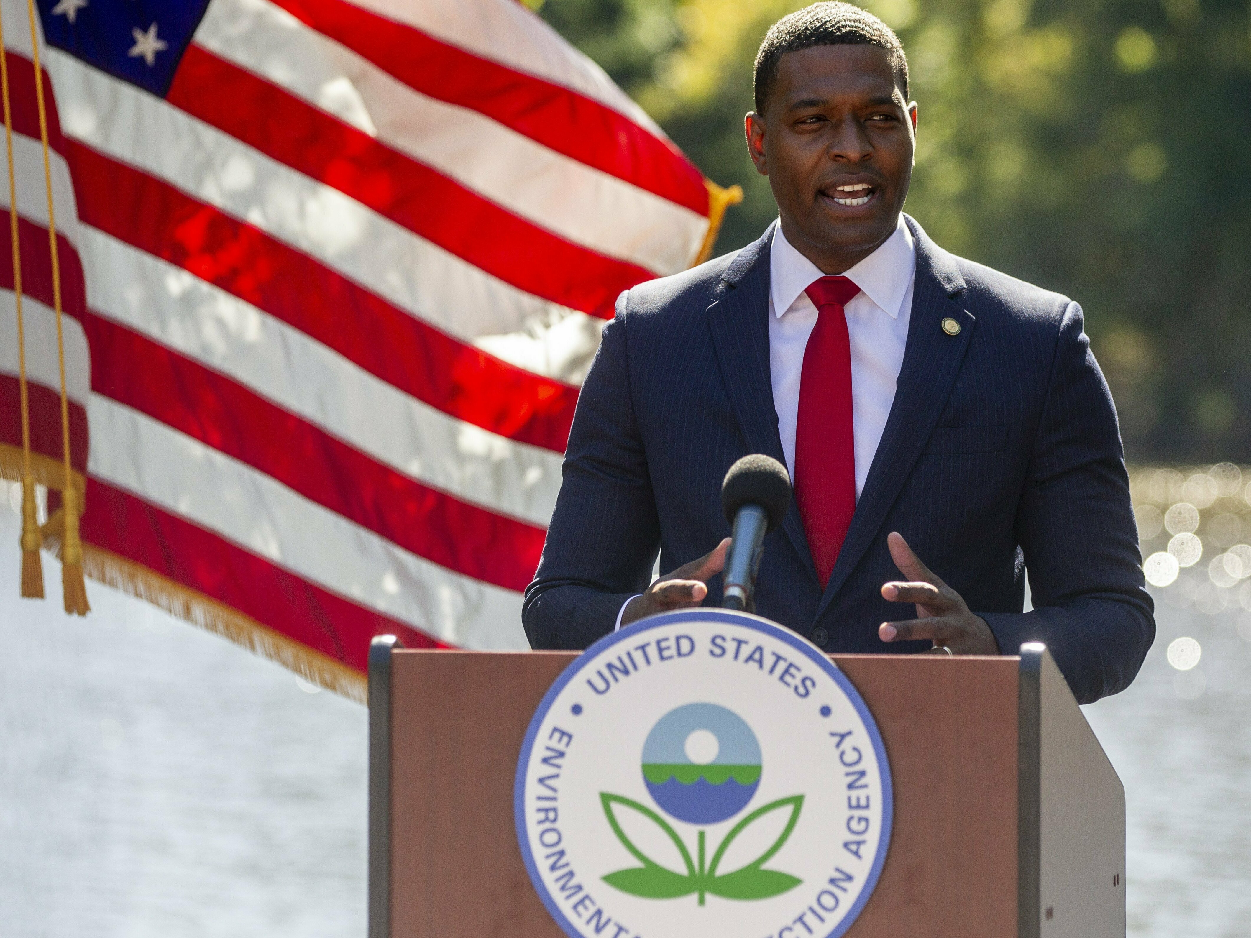 caption: Michael Regan, the head of the Environmental Protection Agency, at an event in 2021. The Biden administration is announcing a plan to regulate "forever chemicals" in drinking water.