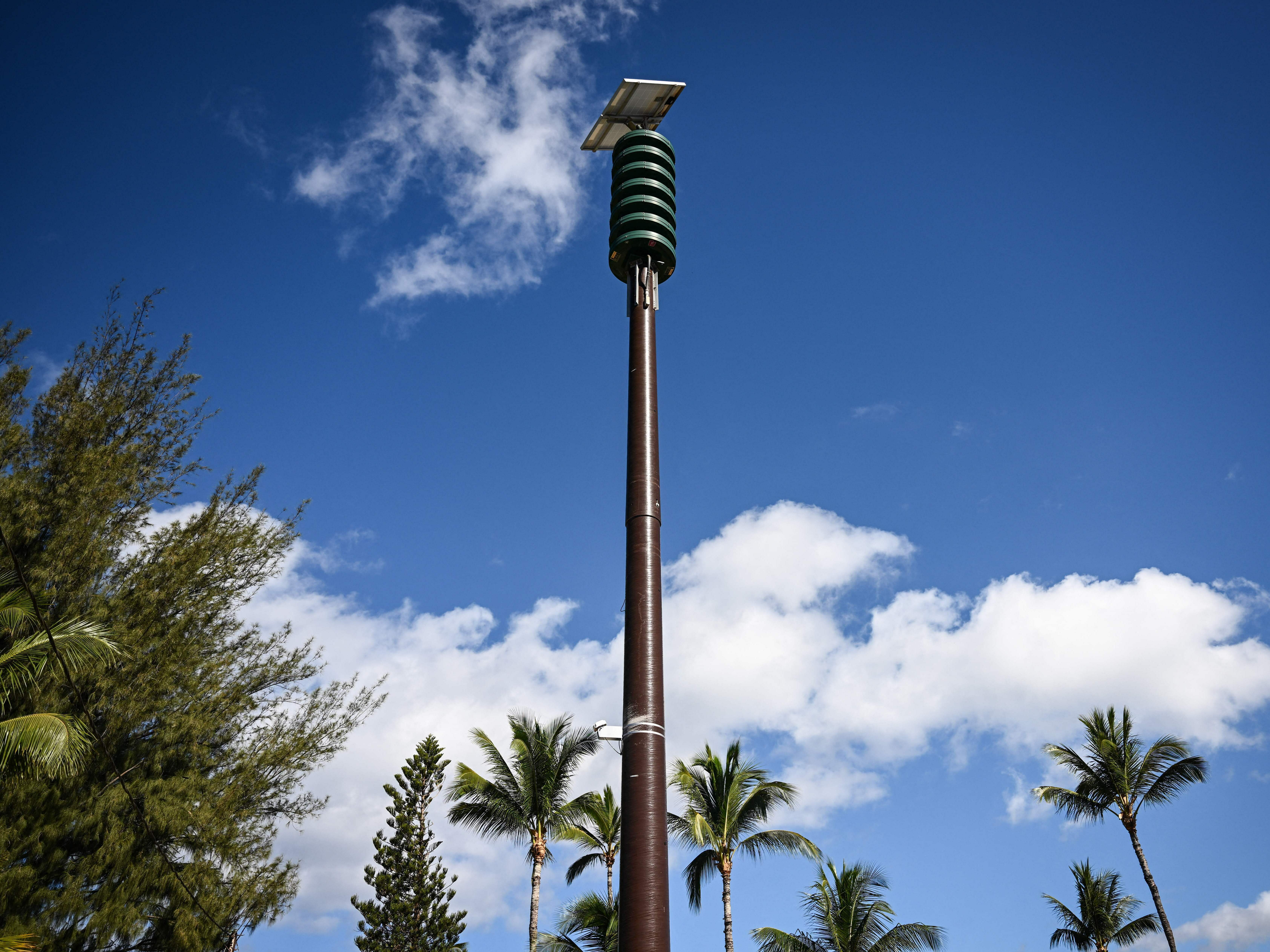 caption: One of the sirens that is part of the state wide emergency alert system is seen in Kihei, Hawaii, on August 13, 2023.