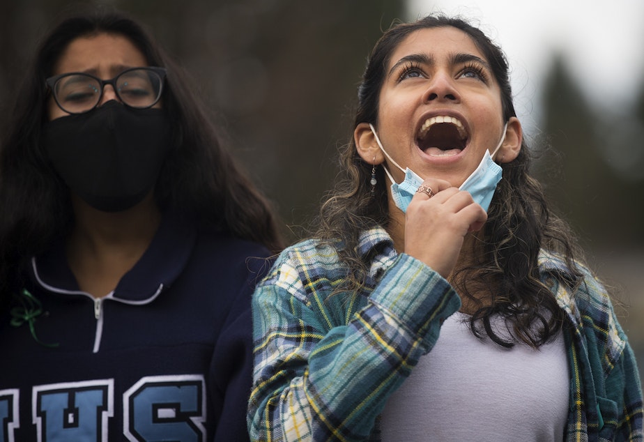 caption: Priyal Sahai leads a chant as Interlake High School students walked out of class in protest of the school's handling of sexual assault cases, on Tuesday, November 23, 2021, at Interlake High School in Bellevue.