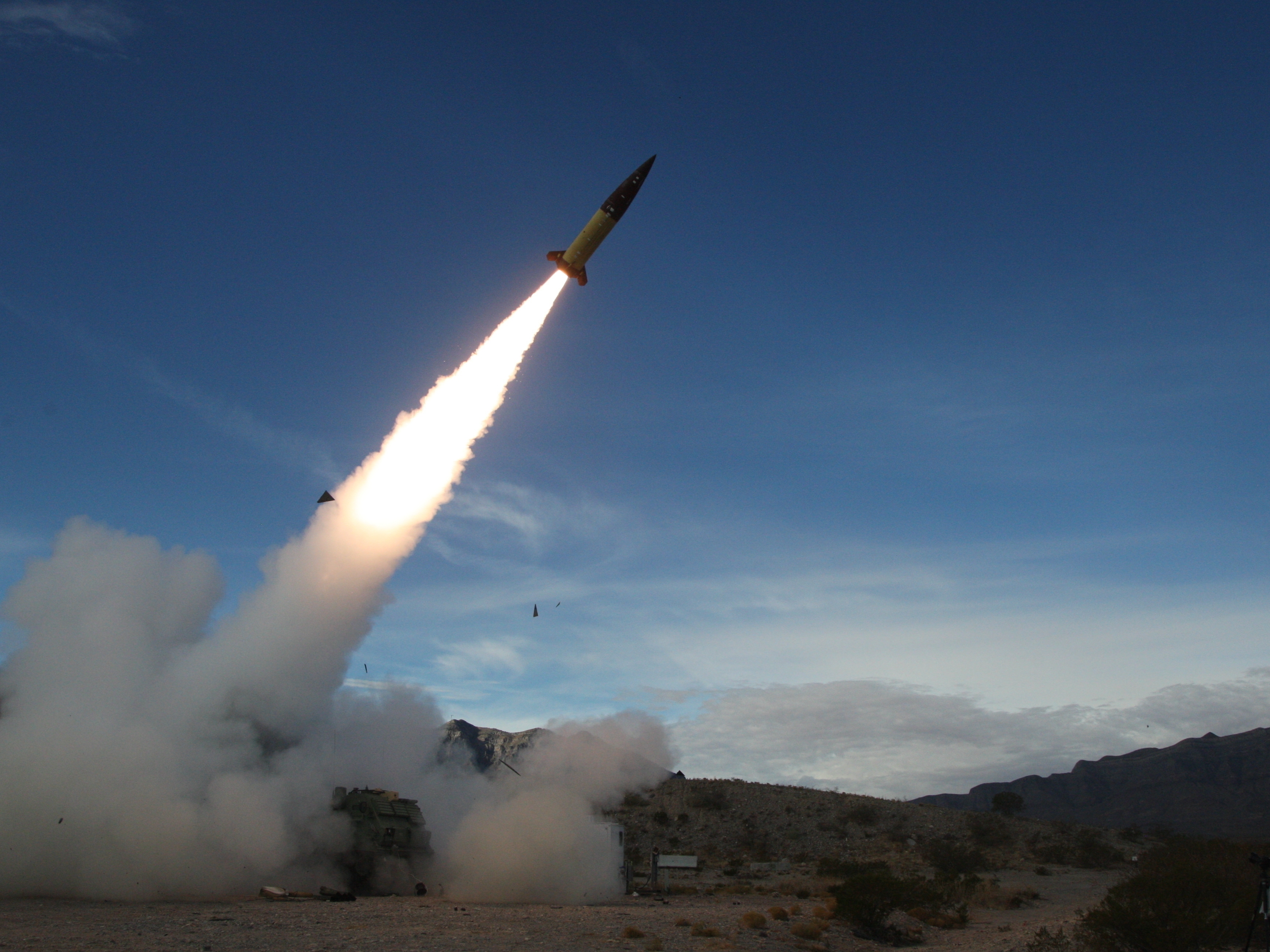 caption: In this image provided by the U.S. Army, soldiers, from the 3rd Battalion, 321st Field Artillery Regiment of the 18th Field Artillery Brigade out of Fort Bragg N.C., conduct live fire testing at White Sands Missile Range, N.M., on Dec. 14, 2021, of early versions of the Army Tactical Missile System.