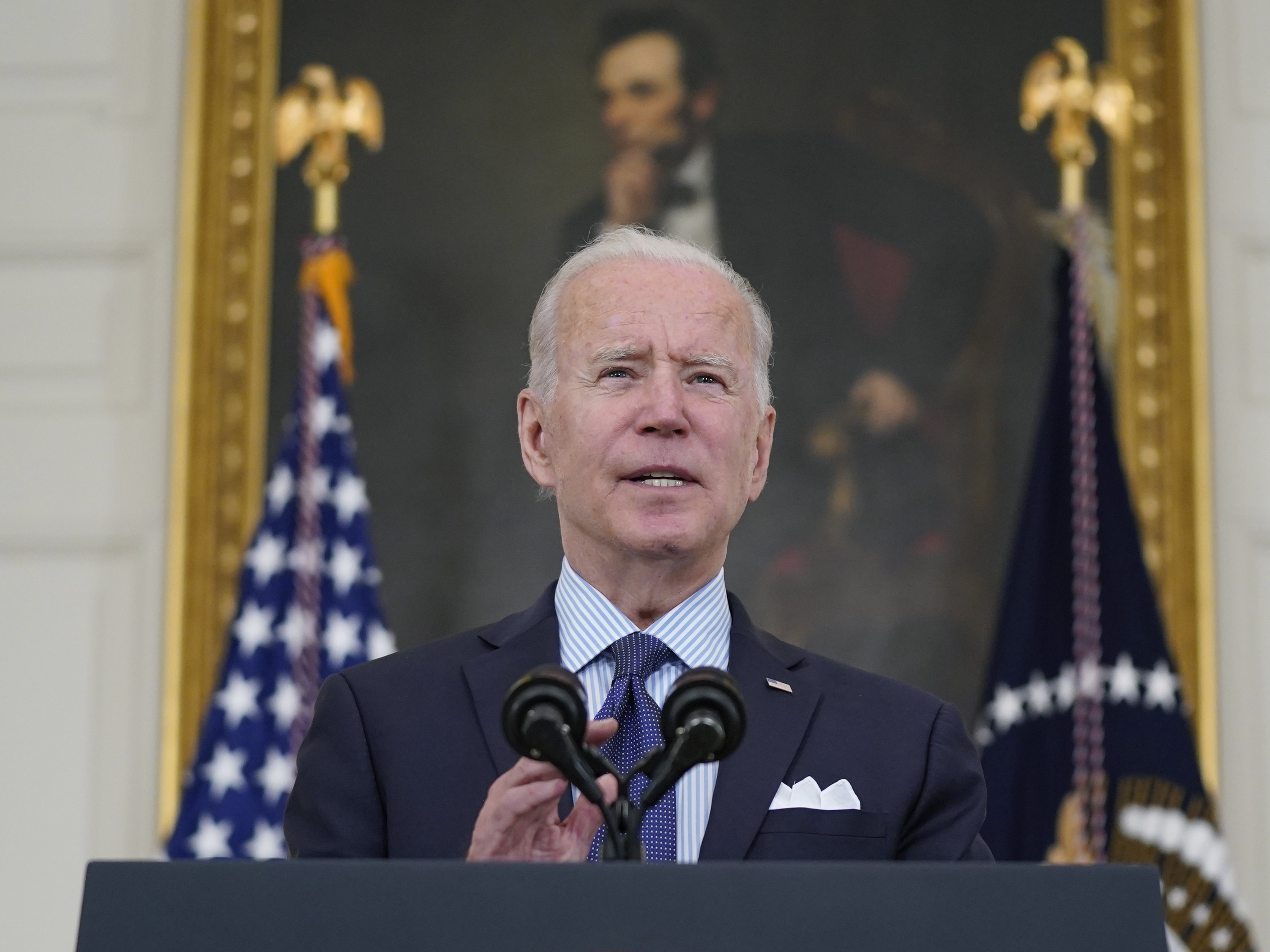 caption: President Biden speaks about the COVID-19 vaccination program Tuesday in the White House. Biden has set a goal of seeing 160 million adults fully vaccinated by July Fourth.