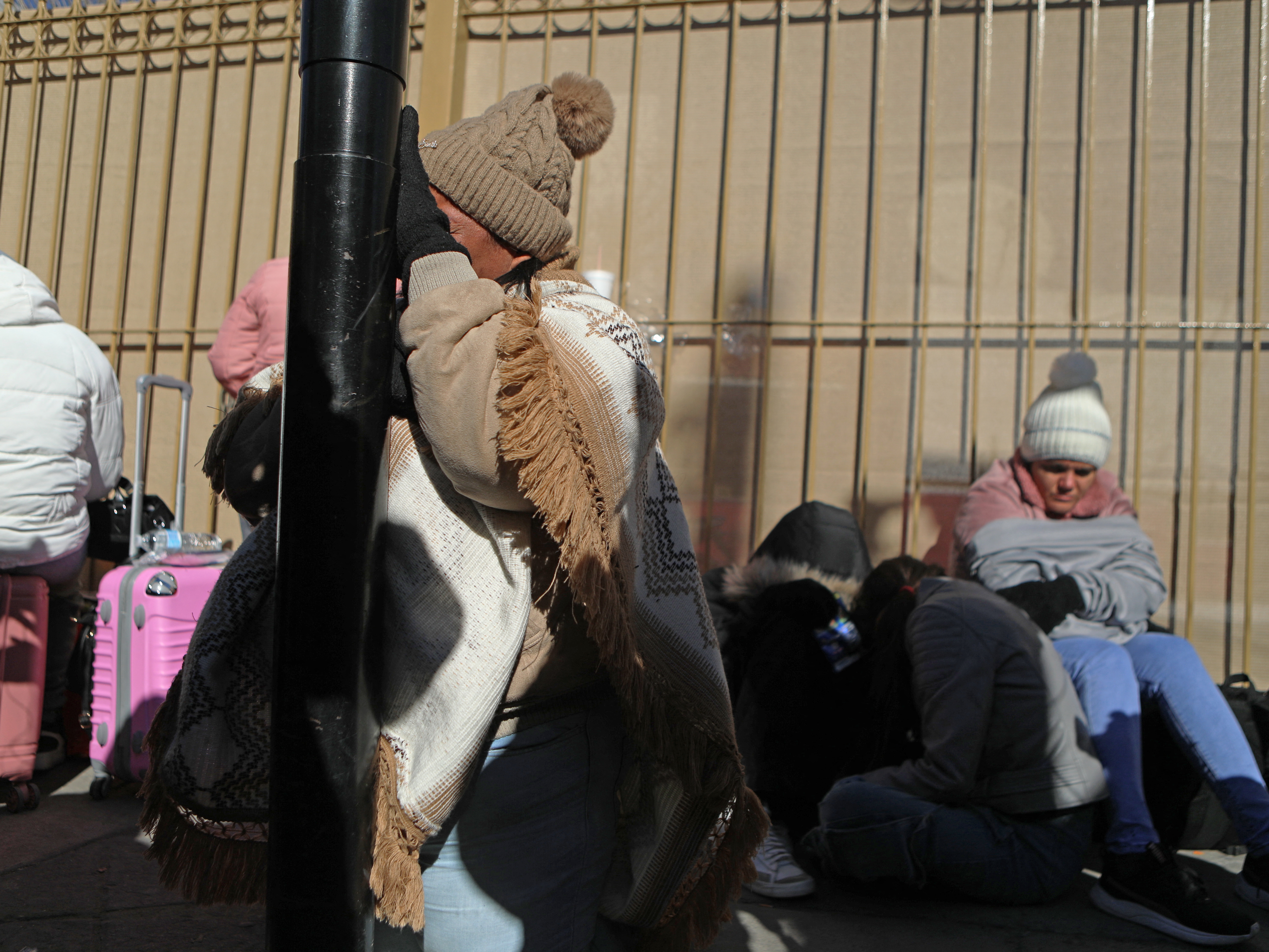 caption: A woman cries in Juarez after learning of the cancellation of the CBP One application on the day of her appointment to enter the U.S.