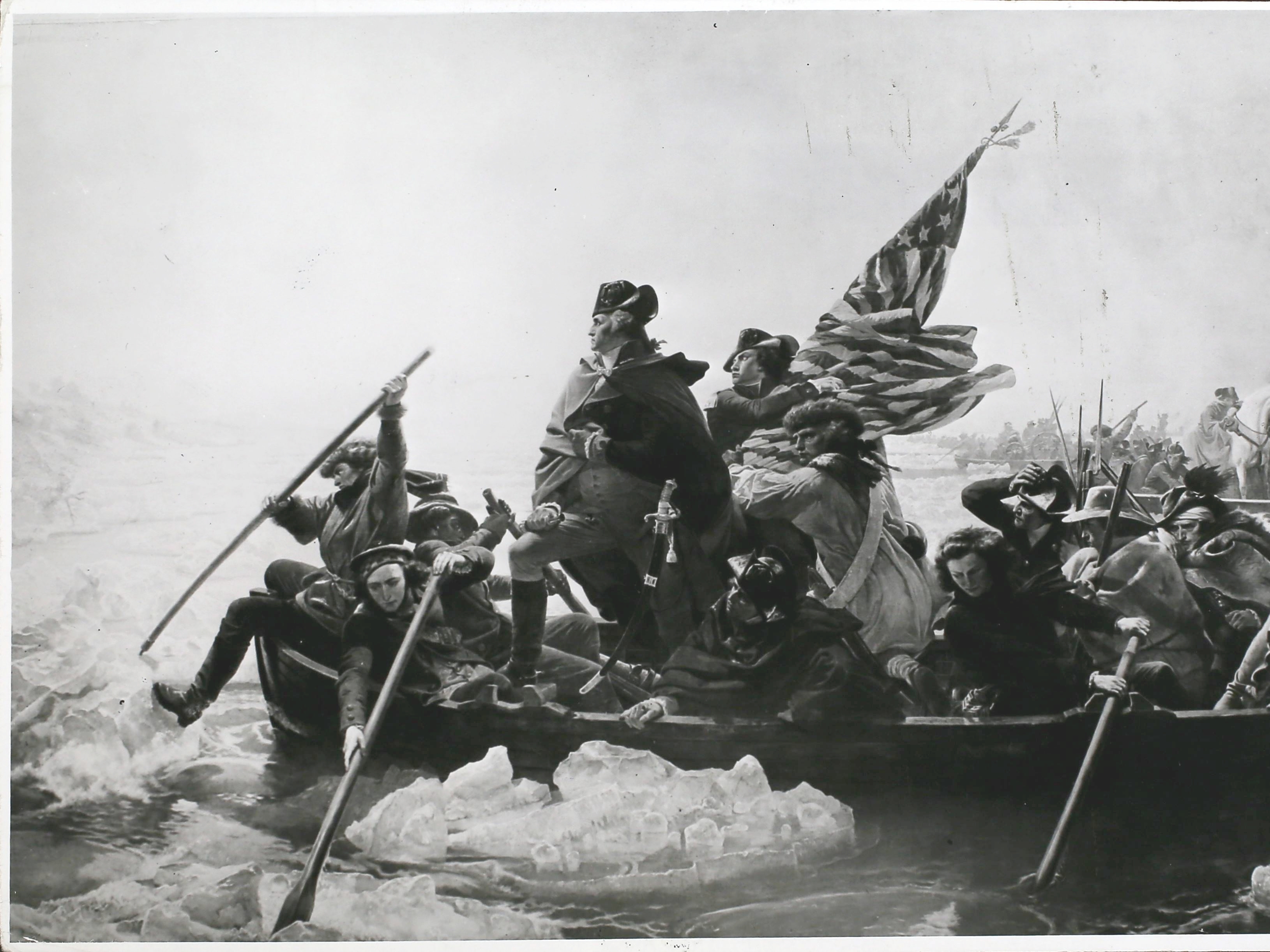 caption: George Washington crosses the Delaware River during the American Revolutionary War in 1776. 