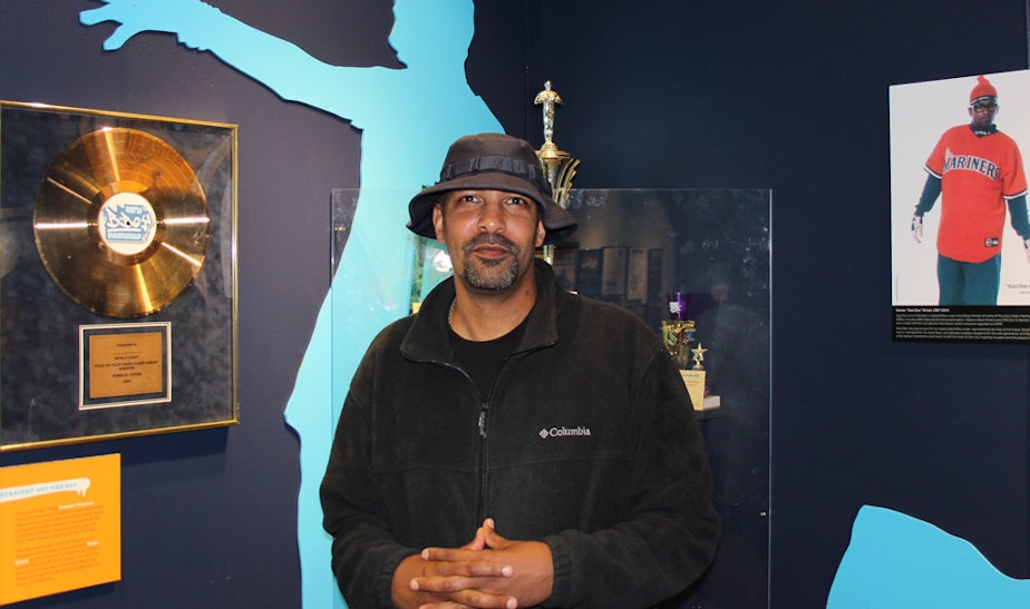 caption: Dr. Daudi Abe, professor and historian, at the 'Legacy of Seattle Hip-Hop' exhibit at MOHAI, Sept. 2015.