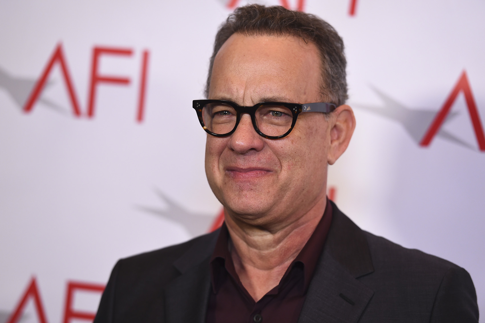 caption: Tom Hanks arrives at the 2018 AFI Awards at the Four Seasons on Friday, Jan. 5, 2018 in Los Angeles. (Photo by Jordan Strauss/Invision/AP)