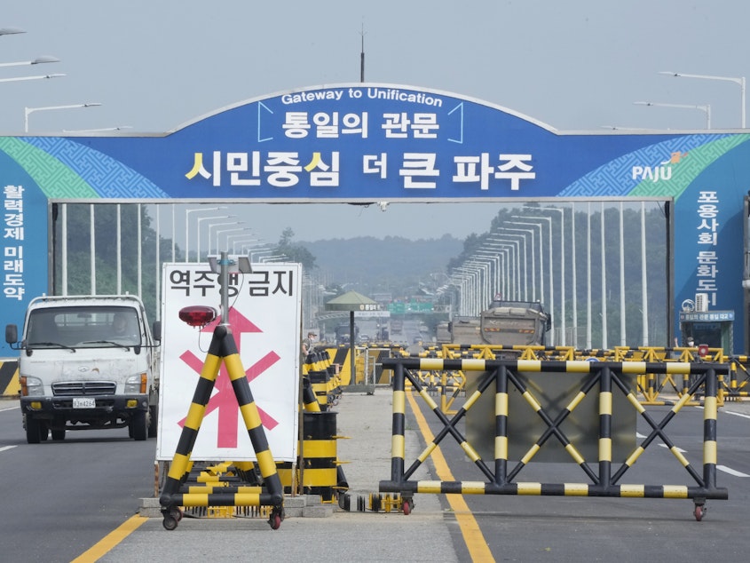 caption: Barricades are placed near the Unification Bridge, which leads to Panmunjom in the Demilitarized Zone in Paju, South Korea, on Wednesday. An American soldier who had served nearly two months in a South Korean prison fled across the heavily armed border into North Korea, U.S. officials said Tuesday, becoming the first American detained in the North in nearly five years.