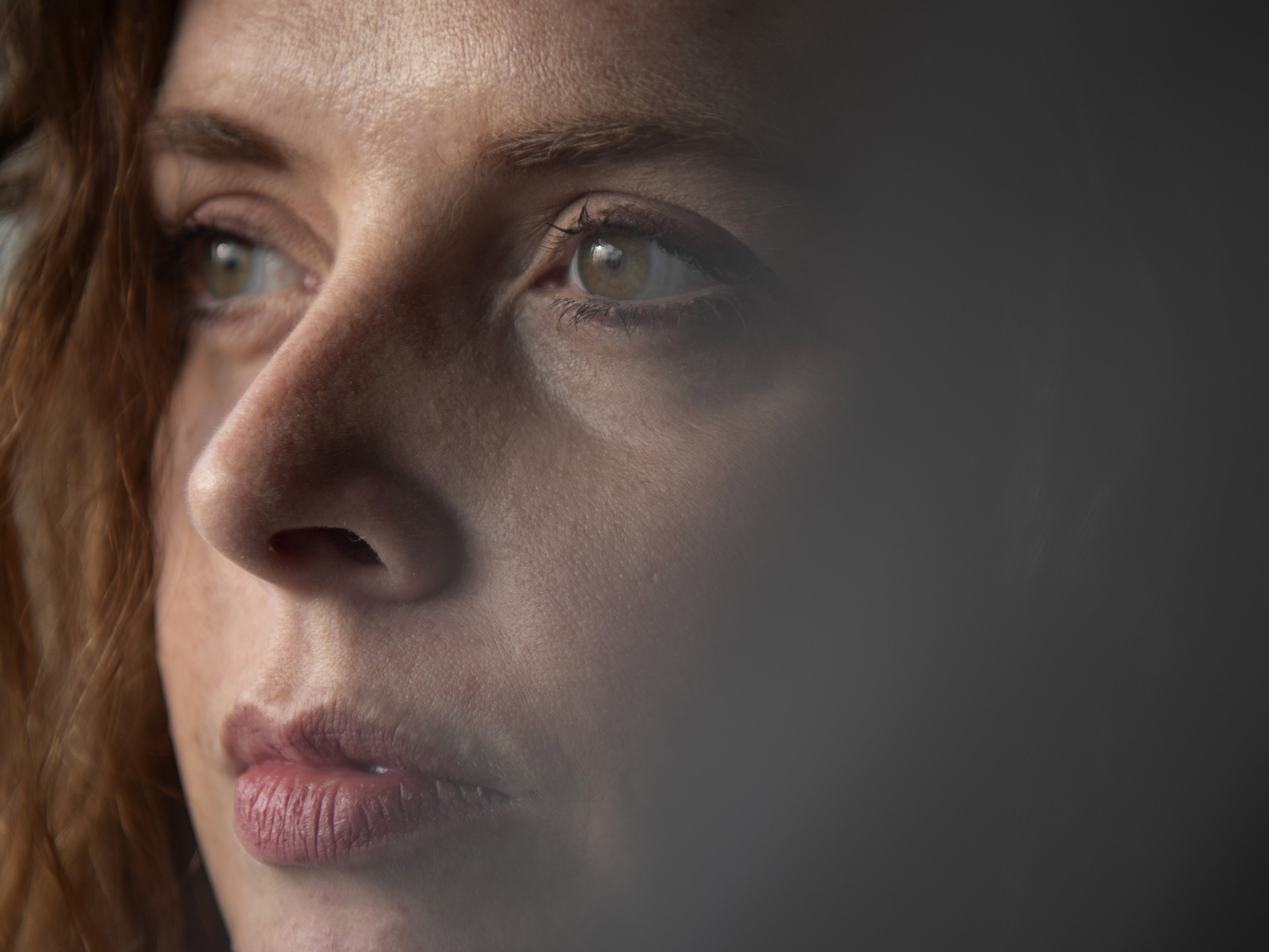 caption: Amanda Cruz took care of her mother, who died of cancer late last year. The experience changed her sense of identity. She is still sorting through what that means.