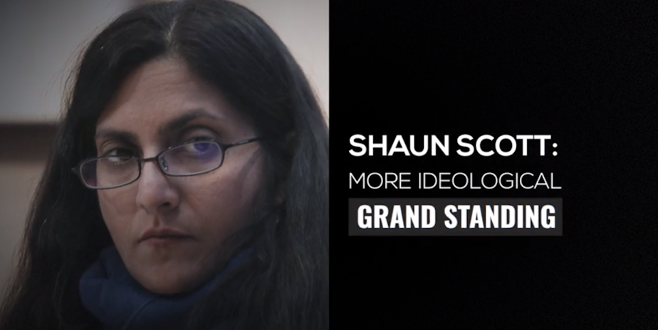 caption: This "People for Seattle" TV ad with a picture of Kshama Sawant is running in District 4 (and Kshama Sawant is running in District 3). The ad attacks Shaun Scott in his race against Alex Pederson. 