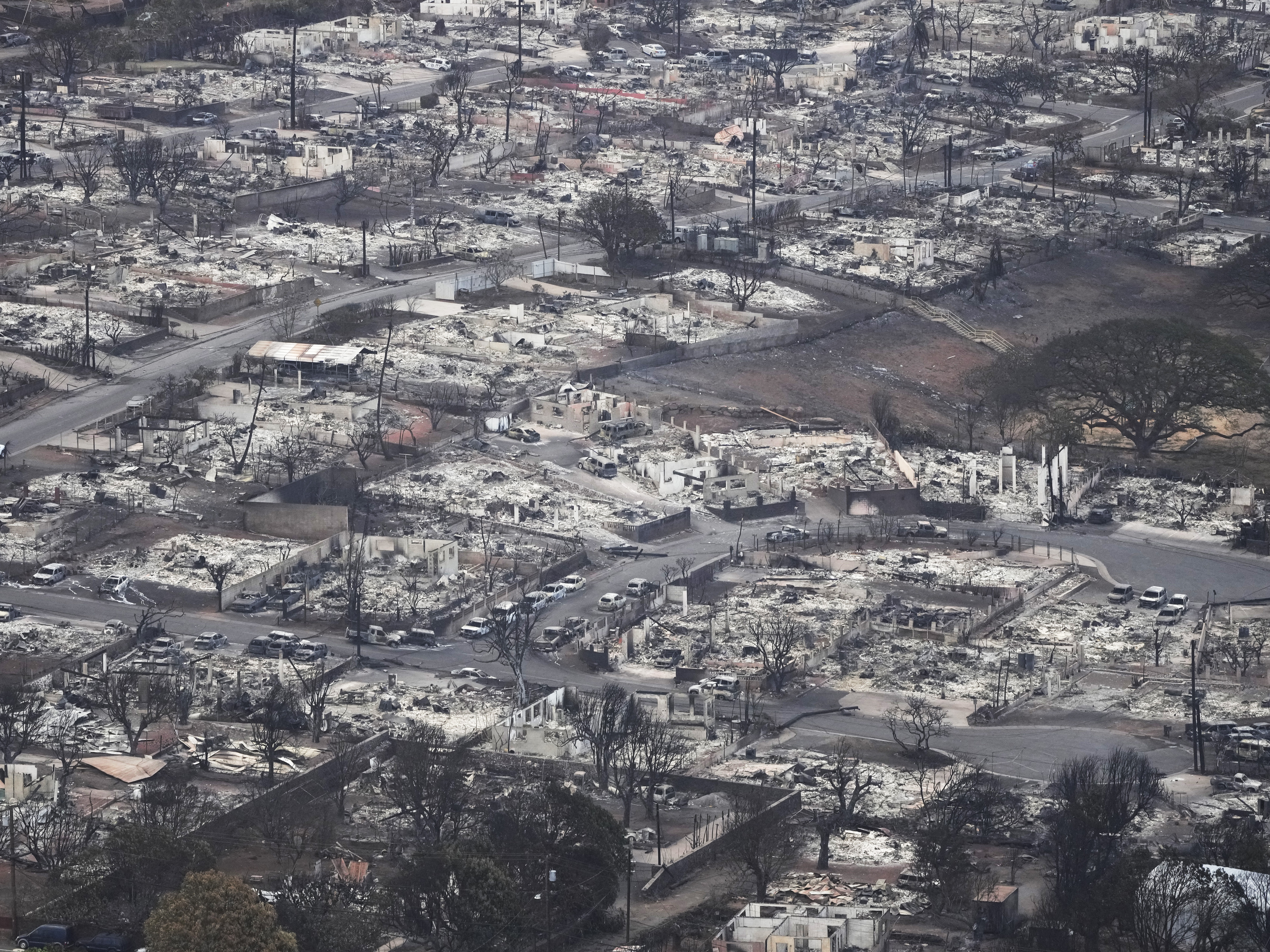 caption: August 10: The search of the wildfire wreckage on the Hawaiian island of Maui on Thursday revealed a wasteland of burned out homes and obliterated communities as firefighters battled the stubborn blaze making it the deadliest in the U.S. in recent years.