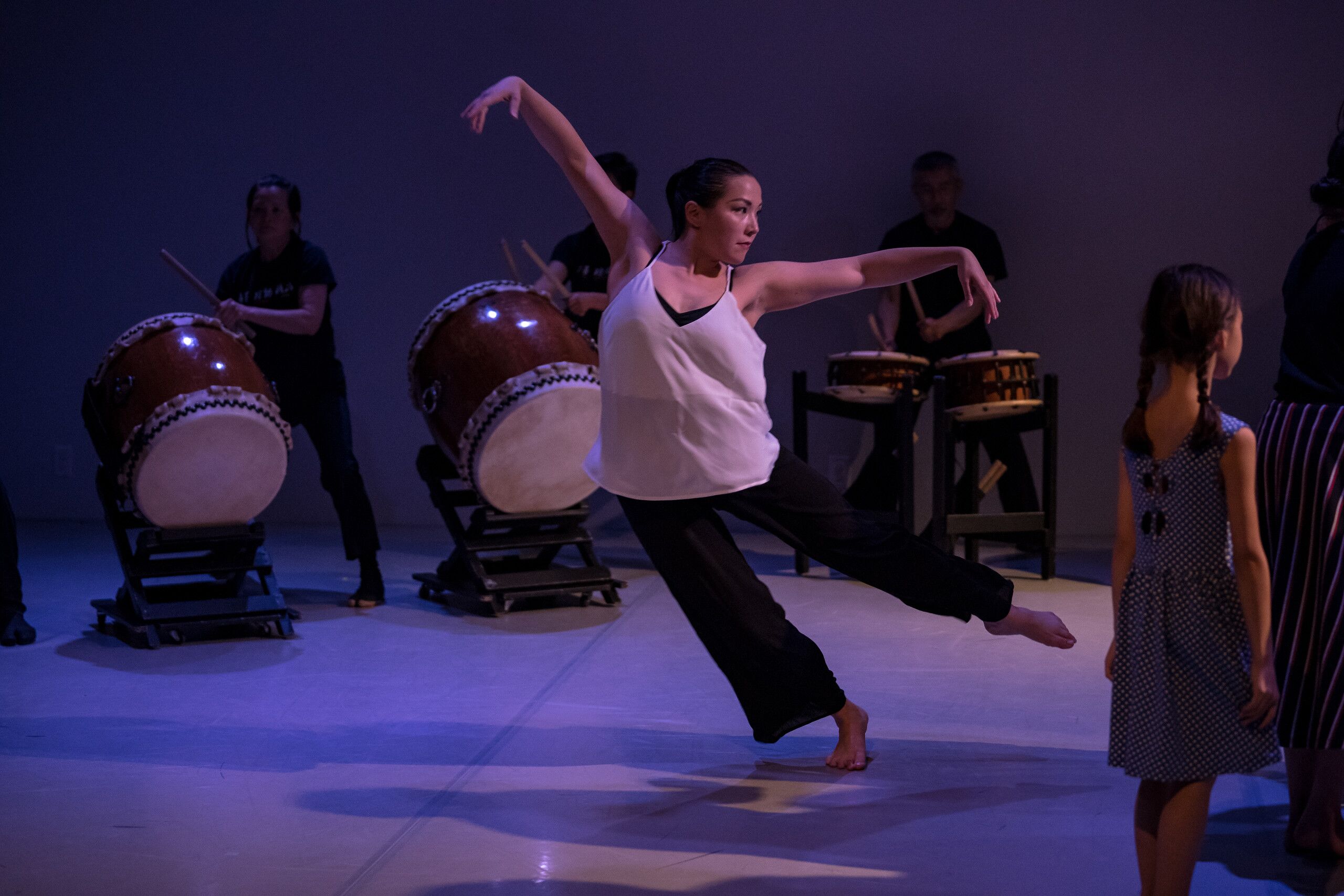 caption: Choreographer Gabrielle Kazuko Nomura Gainor with Seattle Kokon Taiko in her work "Farewell Shikata Ga Nai."
