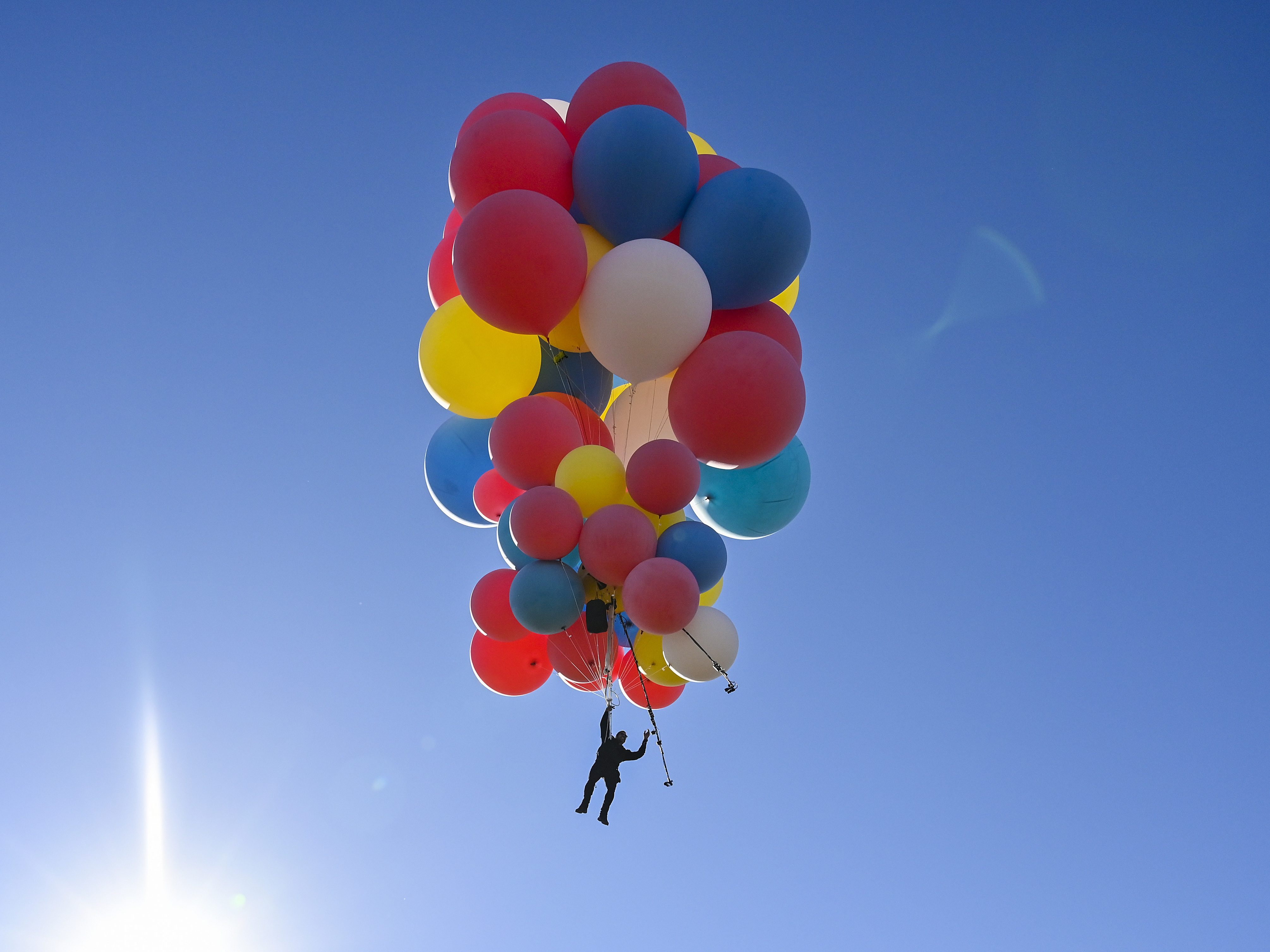 caption: David Blaine performs the stunt "Ascension" on September 02, 2020 in Page, Arizona.