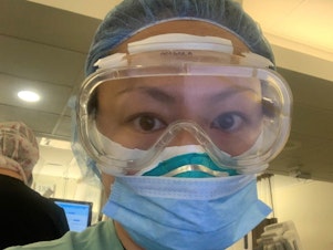 caption: Dr. Angela Chen, an emergency physician at The Mount Sinai Hospital in New York City, diagnosed the city's first confirmed COVID-19 case last March.