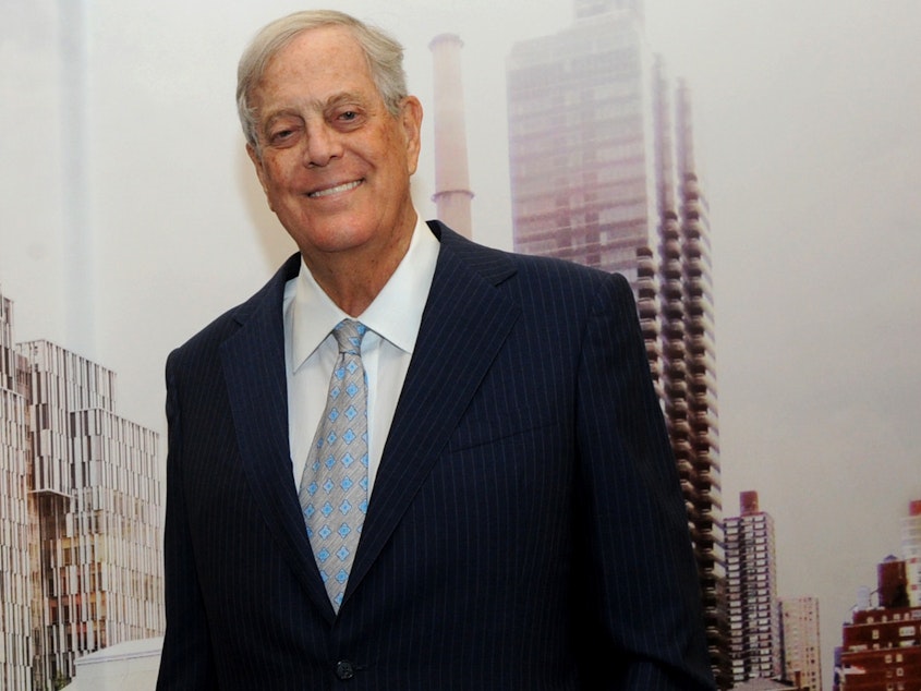 caption: David Koch with a rendering of The David H. Koch Center for Cancer Care in 2015. The billionaire underwrote both old-fashioned charitable causes and the conservative movement, reshaping U.S. politics.