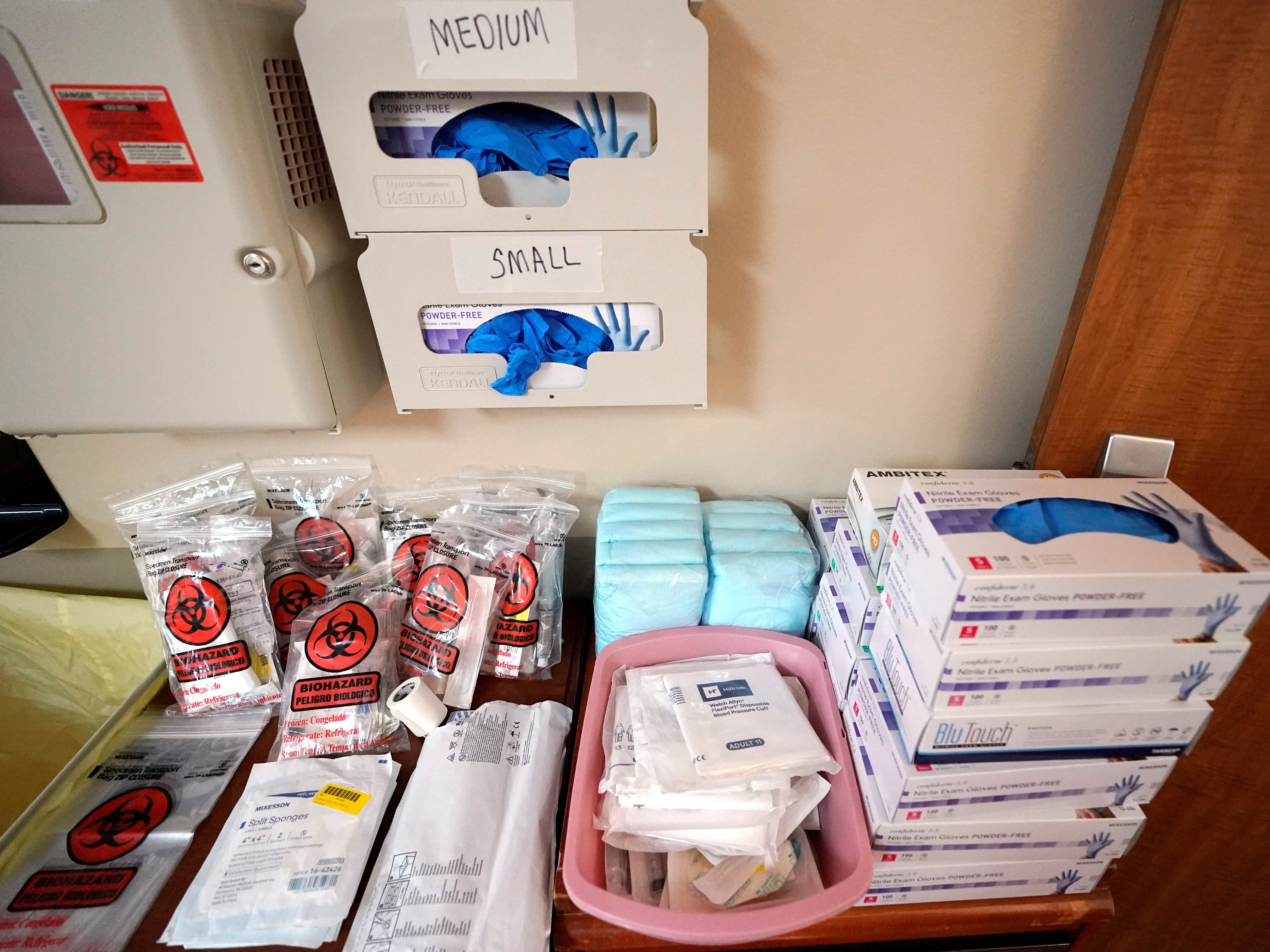 caption: PPE and medical supplies to be used by members of the Urban Augmentation Medical Task Force, are shown inside a wing at United Memorial Medical Center in Houston, Texas.