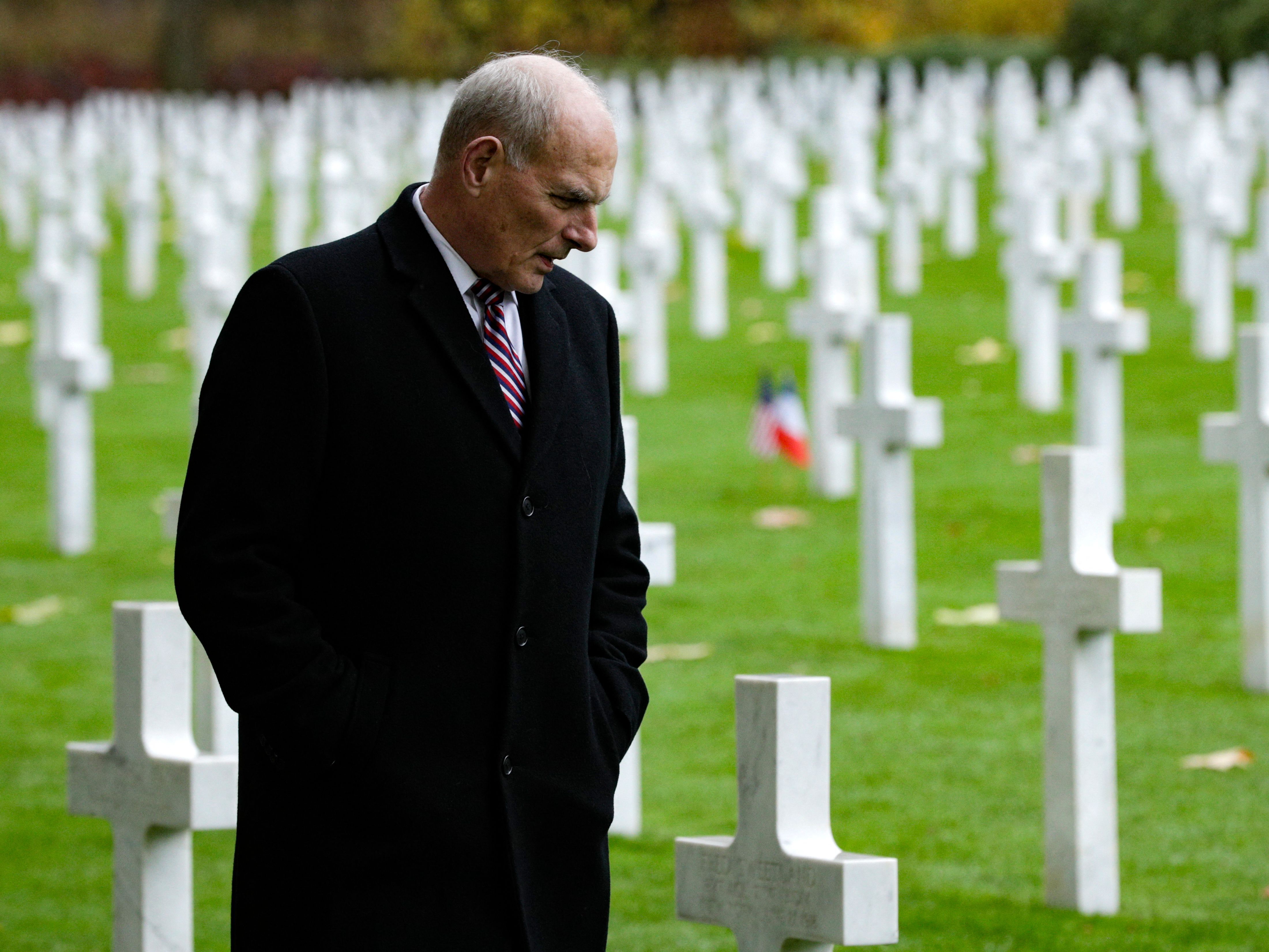 caption: Former White House chief of staff John Kelly, seen here on a visit to the Aisne-Marne American Cemetery and Memorial in Belleau, France, in 2018, has criticized his former boss Donald Trump.