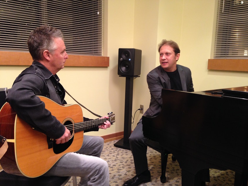 caption: Pearl Jam guitarist Mike McCready with Seattle Symphony Music Director Ludovic Morlot.