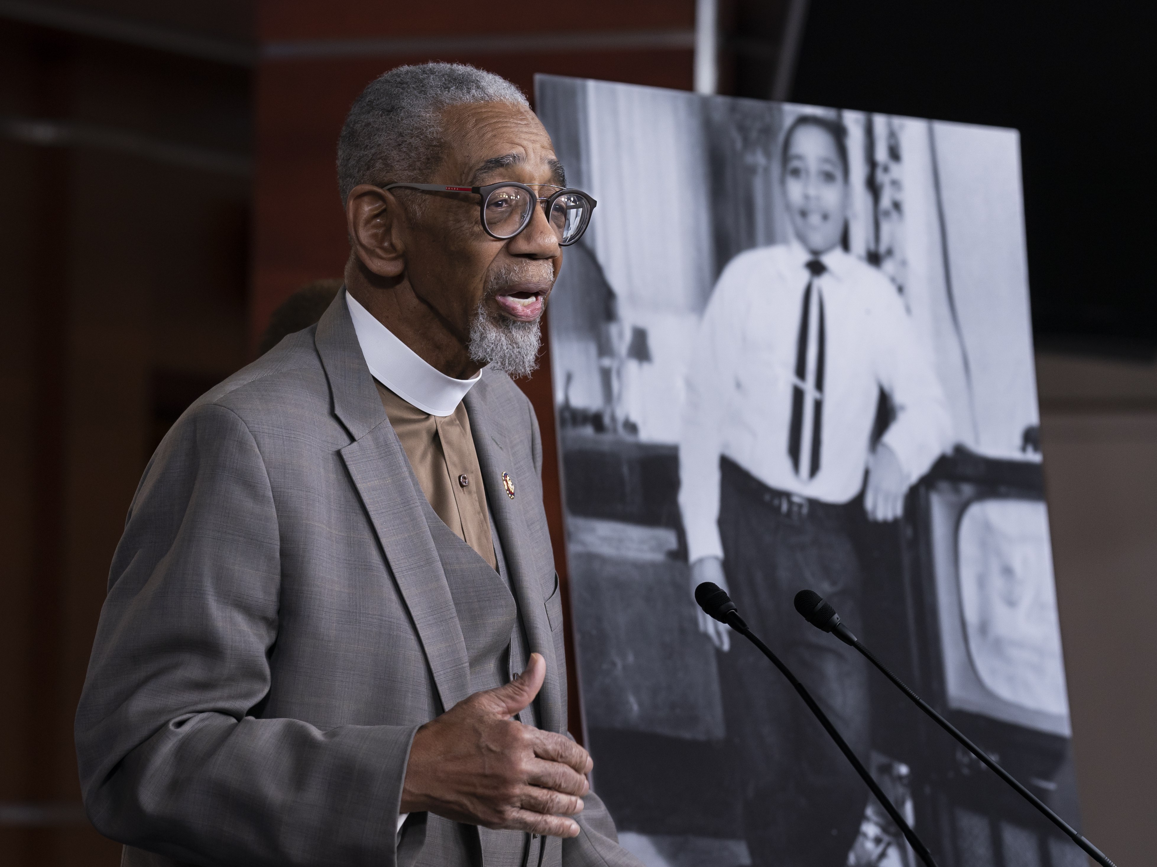 caption: Rep. Bobby Rush, D-Ill., speaks during a news conference about the Emmett Till Antilynching Act on Wednesday on Capitol Hill. He stands beside a photo of Emmett Till, a 14-year-old African American who was lynched in Mississippi in the 1950s.